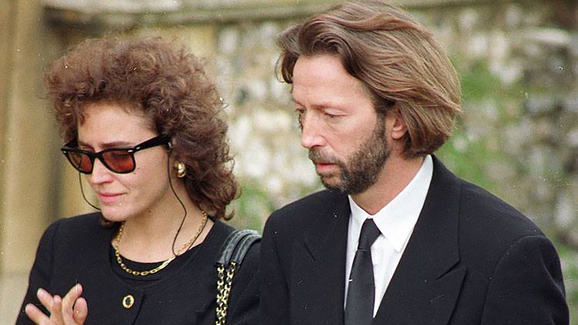 Clapton y Lory en el funeral de su hijo.