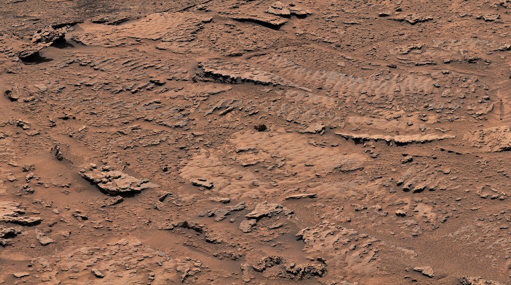 Hace miles de millones de años, las olas en la superficie de un lago poco profundo levantaron sedimentos en el fondo del lago. Con el tiempo, el sedimento se convirtió en rocas con texturas onduladas que son la evidencia más clara de olas y agua que el rover Curiosity Mars de la NASA haya encontrado. (Crédito: NASA/JPL-Caltech/MSSS)