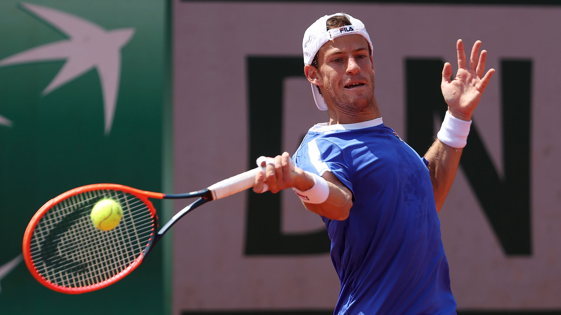 PARIS, FRANCE - MAY 29: Diego Schwartzman of Argentina plays a forehand against Bernabe Zapata Miralles of Spain during their Men's Singles First Round Match on Day Two of the 2023 French Open at Roland Garros on May 29, 2023 in Paris, France. (Photo by Julian Finney/Getty Images)