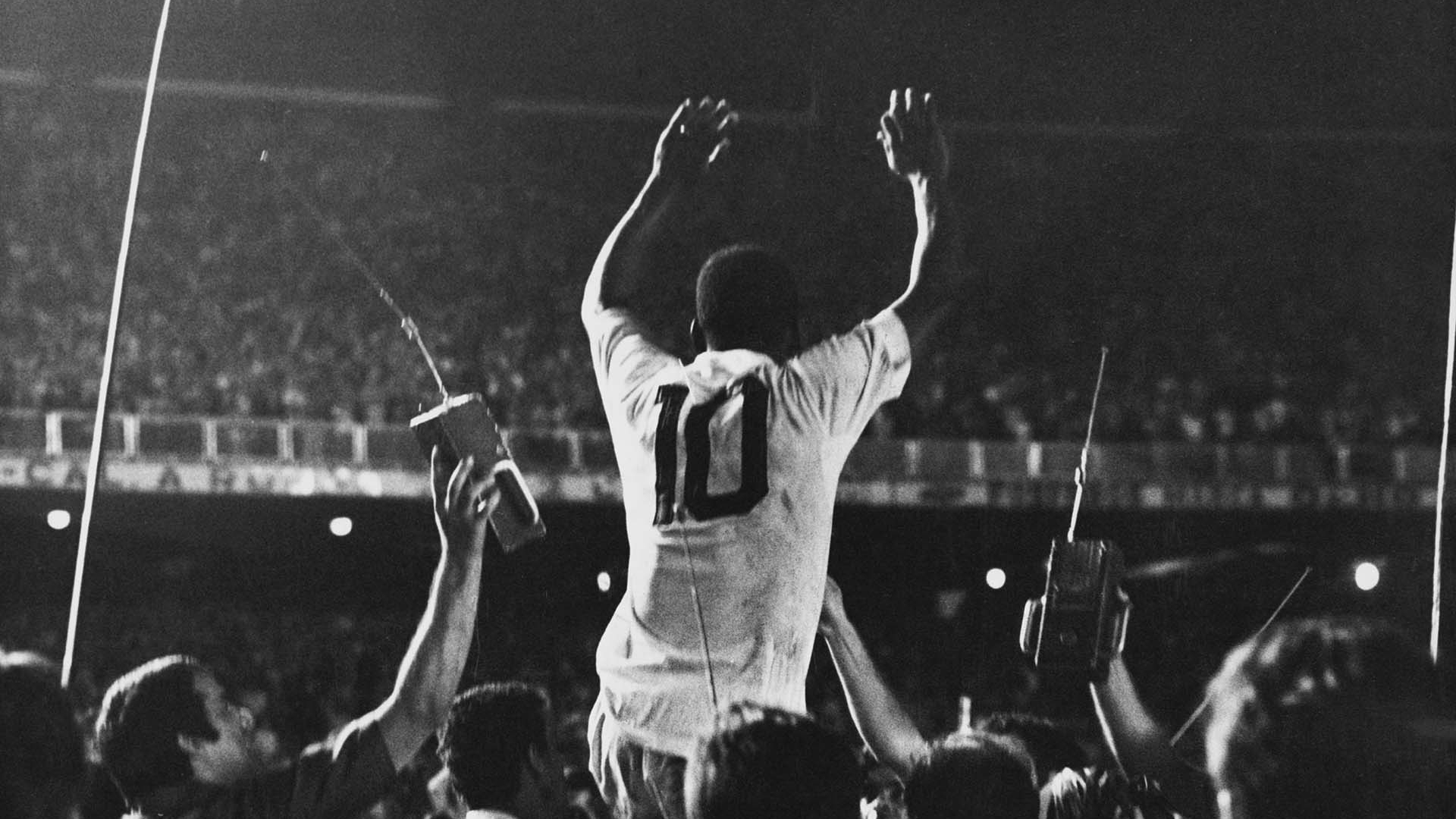 Pele is lifted up by his Santos team mates after scoring the 1,000th goal of his career during a game against Vasco da Gama at the Maracana Stadium, Rio de Janeiro, Brazil, 19th November 1969. (Photo by Pictorial Parade/Archive Photos/Getty Images)