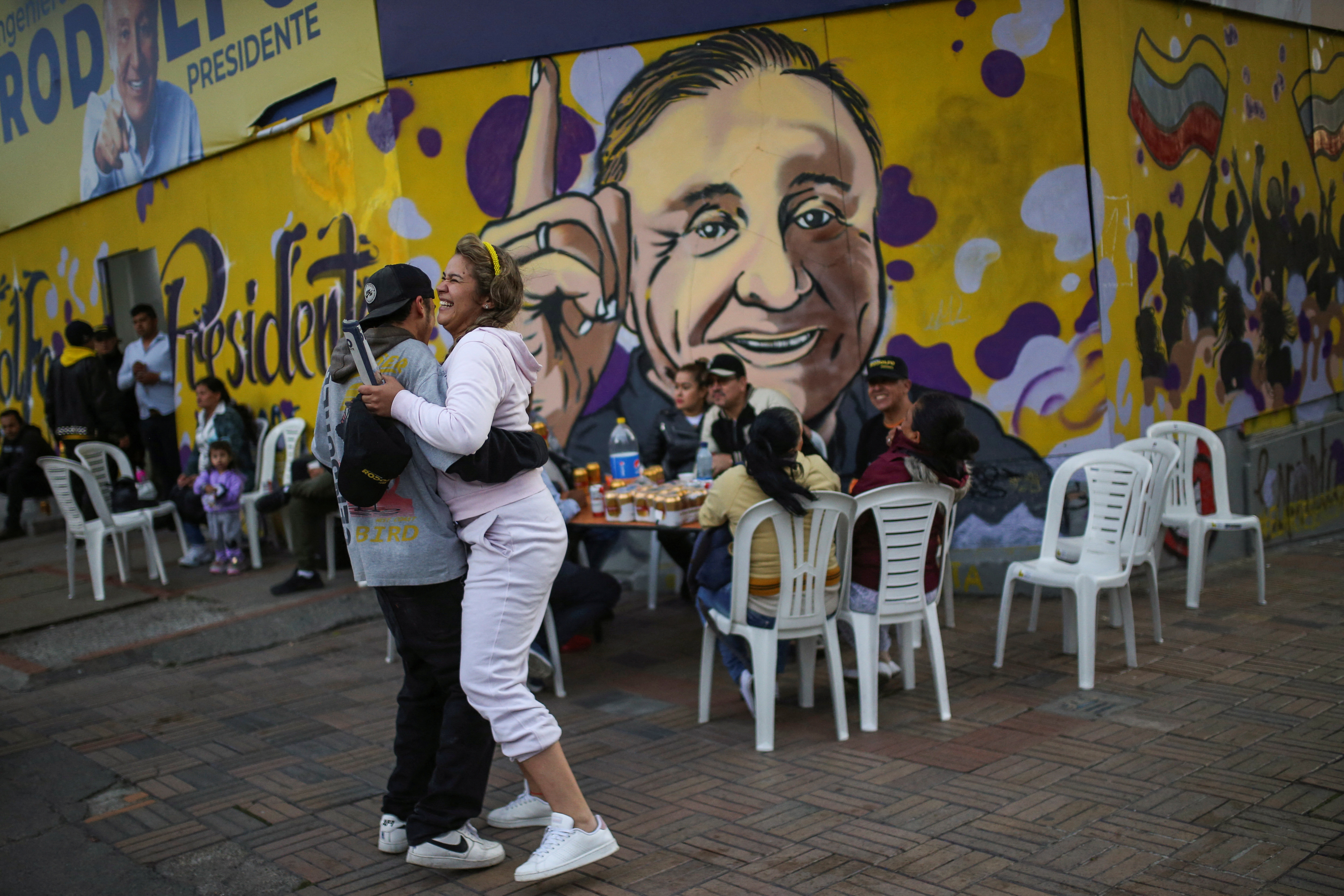 Supporters of Colombian centre-right presidential candidate Rodolfo Hernandez of Anti-Corruption Rulers' League Party gather after he came out second in the first round of the presidential election, in Bogota, Colombia May 30, 2022. REUTERS/Luisa Gonzalez