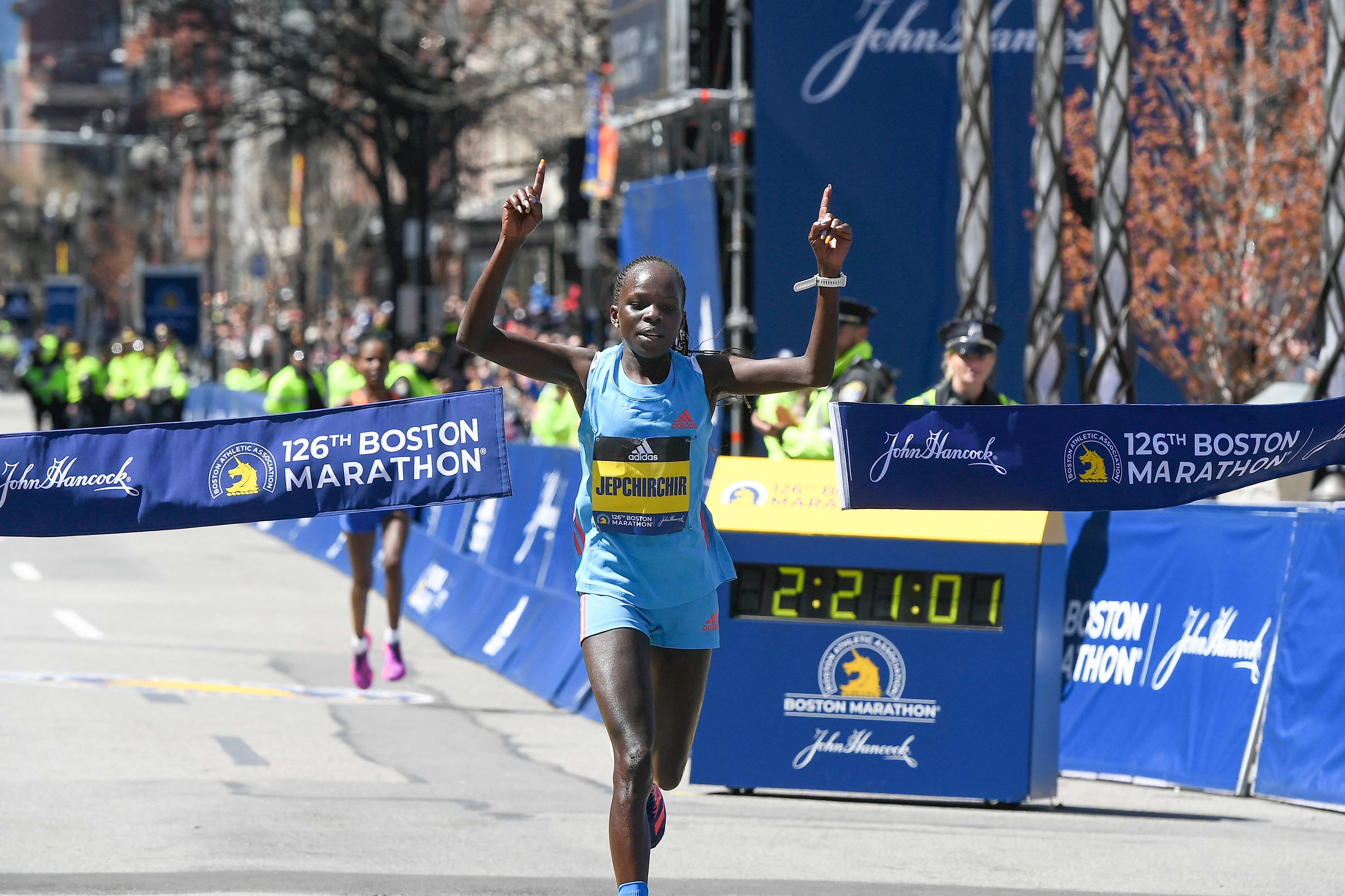 Apr 18, 2022; Boston, MA, USA; Peres Jepchirchir of Kenya crosses the finish line at the 2022 Boston Marathon.   Mandatory Credit: Eric Canha-USA TODAY Sports