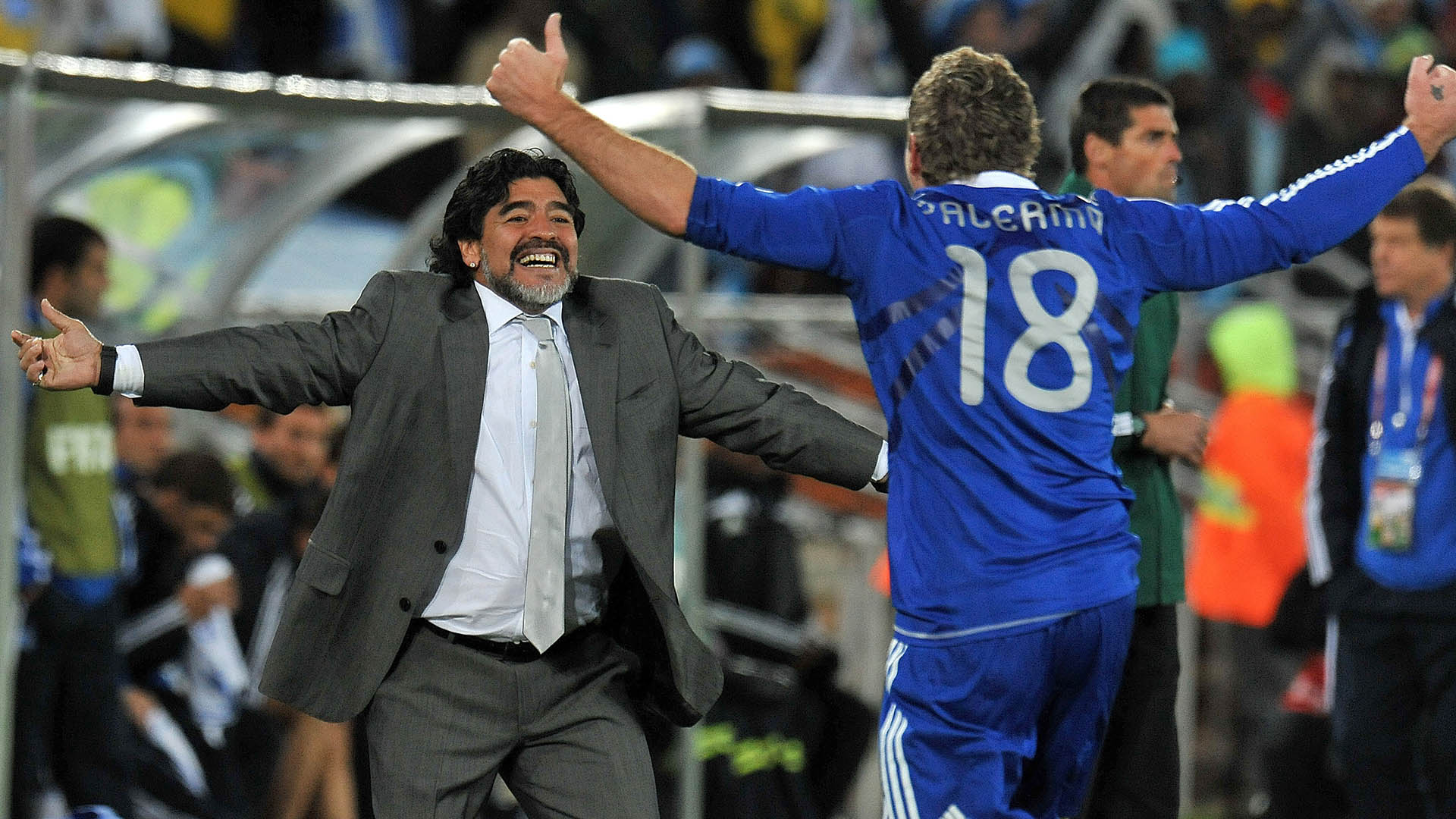 POLOKWANE, SOUTH AFRICA - JUNE 22: Martin Palermo of Argentina celebrates after scoring his team second goal with Diego Armando Maradona head coach of Argentina during the FIFA World Cup 2010 Group B match between Grecee and Argentina at Peter Mokaba Stadium on June 22, 2010 in Polokwane, South Africa.  (Photo by Alessandro Sabattini/Getty Images)