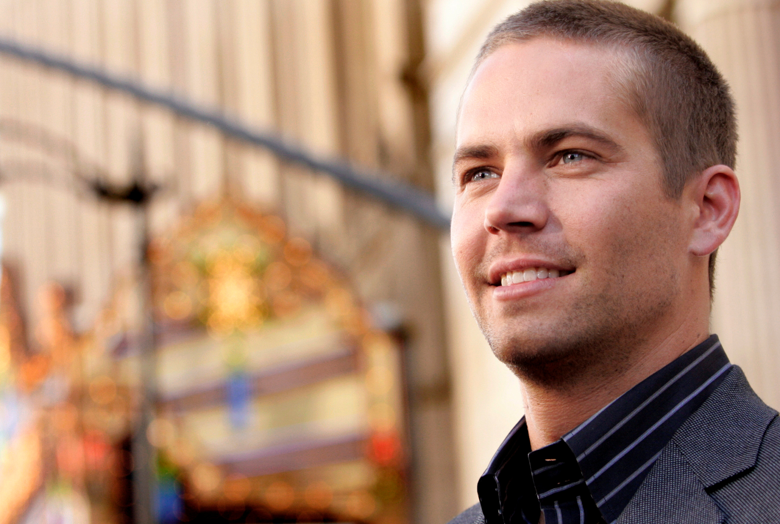 FILE PHOTO: Cast member Paul Walker poses at the world premiere of Walt Disney Pictures "Eight Below" at El Capitan theatre in Hollywood February 12, 2006. The movie, inspired by a true story, portrays the adventures of a scientific expedition, led by Jerry Shepard (Paul Walker), who is forced to leave behind their team of dogs due to an accident in Antarctica. REUTERS/Mario Anzuoni/File Photo