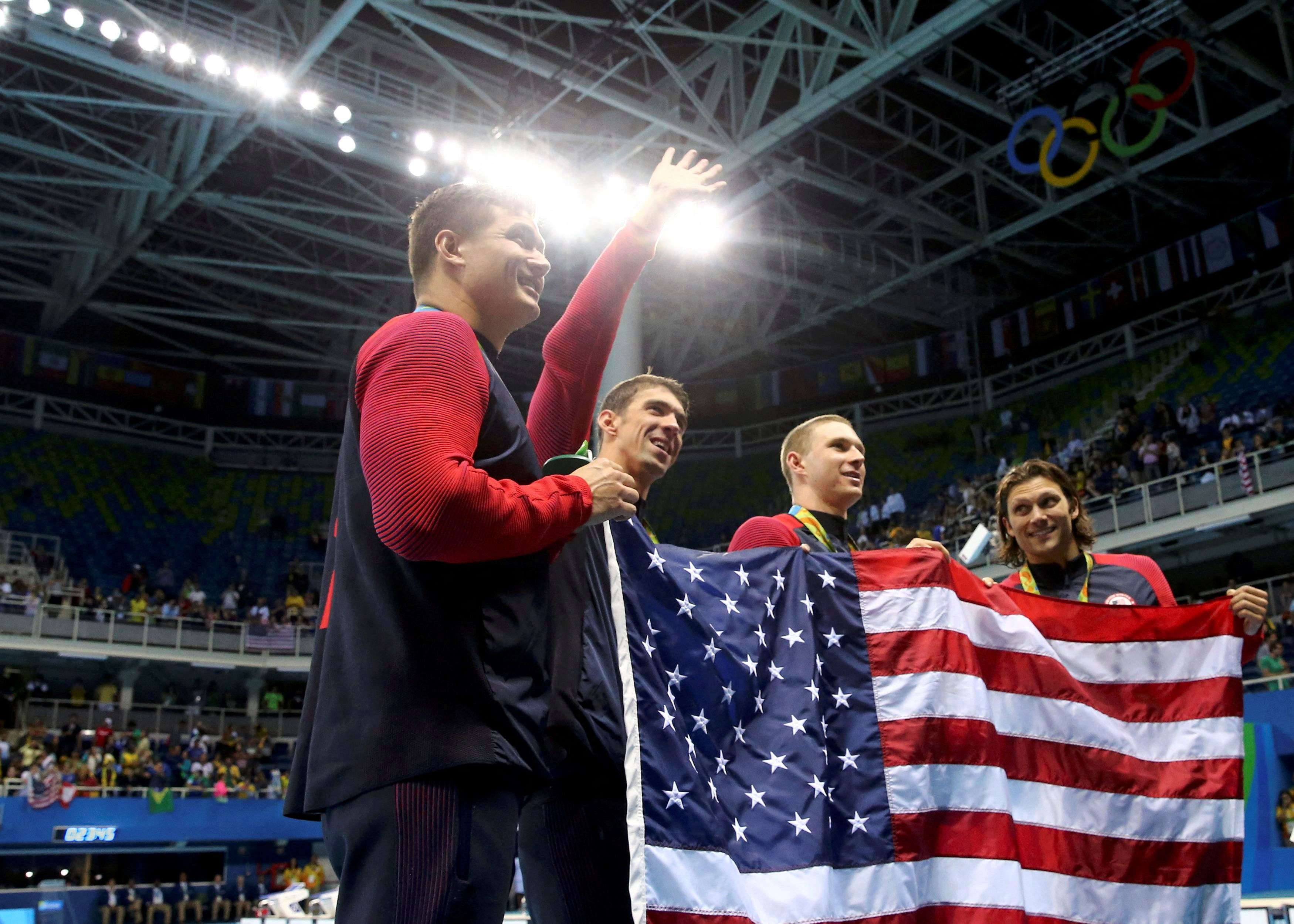FILE PHOTO: 2016 Rio Olympics - Swimming - Victory Ceremony - Men's 4 x 100m Medley Relay Victory Ceremony - Olympic Aquatics Stadium - Rio de Janeiro, Brazil - 13/08/2016. Team USA celebrates their gold win. REUTERS/Marcos Brindicci/File Photo FOR EDITORIAL USE ONLY. NOT FOR SALE FOR MARKETING OR ADVERTISING CAMPAIGNS.