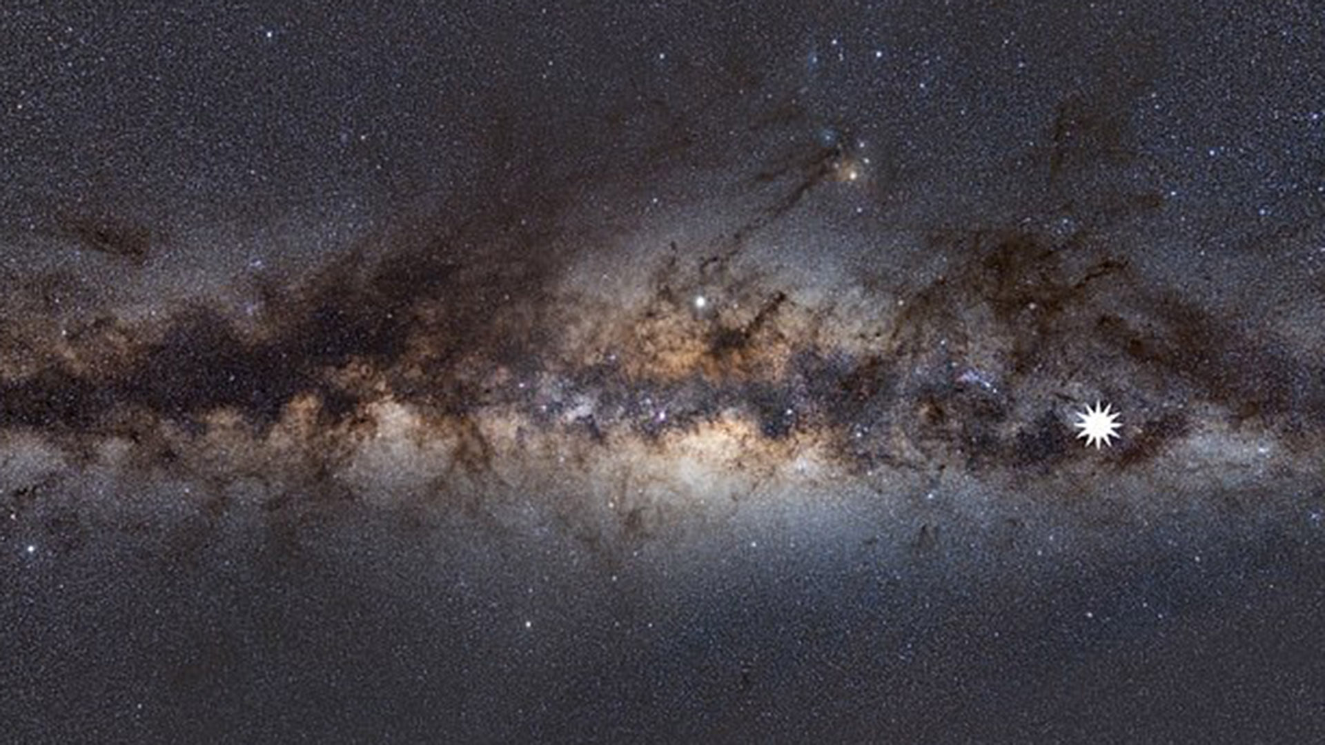 Esta imagen muestra la Vía Láctea vista desde la Tierra. El icono de la estrella muestra la posición del misterioso objeto que los astrónomos han descubierto (ICRAR)