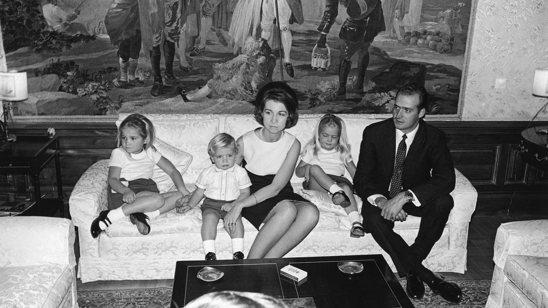 Prince Juan Carlos, future King of Spain at home in the Palace of Zarzuela, near Madrid, with his wife Princess Sophia and their children (left to right) Princess Elena, Prince Felipe and Princess Cristina, December 1969. (Photo by Express/Hulton Archive/Getty Images)