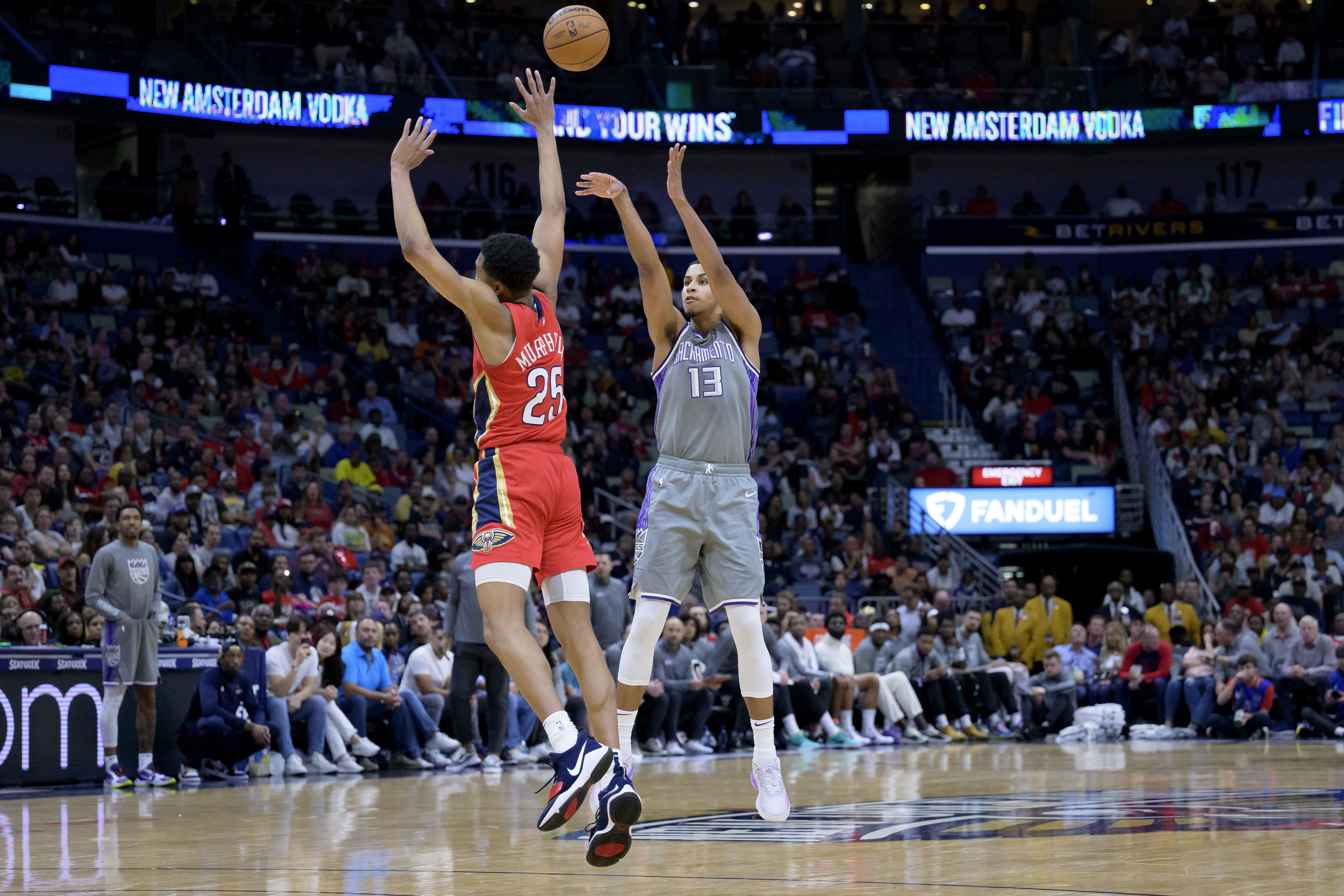 Sacramento Kings' Keegan Murray shoots past New Orleans Pelicans' Trey Murphy III, Tuesday, April 4, 2023. (AP Photo/Matthew Hinton)