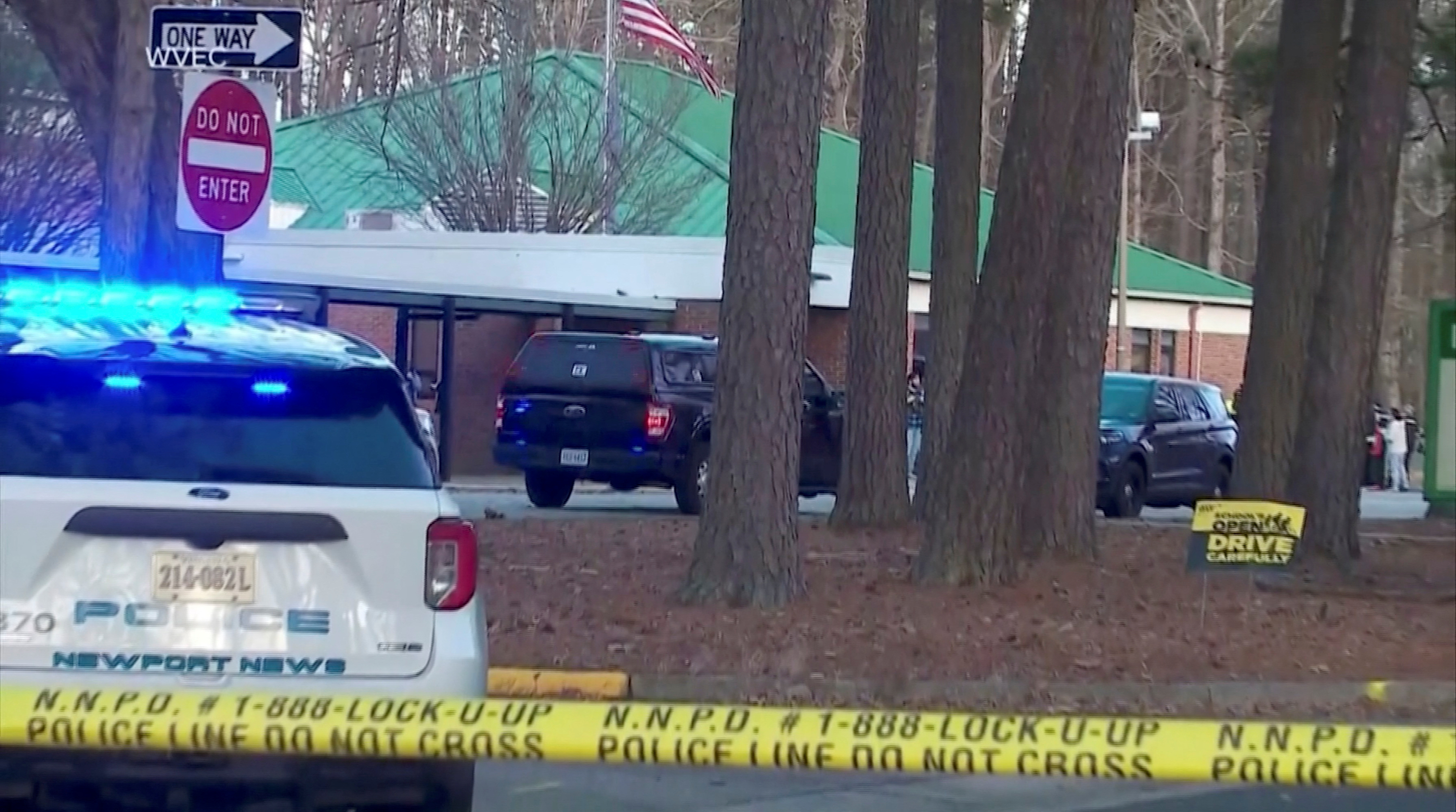 Police vehicles are seen parked outside Richneck Elementary School, where according to the police, a six-year-old boy shot and wounded a teacher, in Newport News, Virginia, U.S., January 6, 2023, in this screen grab from a handout video. WVEC via ABC/Handout via REUTERS THIS IMAGE HAS BEEN SUPPLIED BY A THIRD PARTY NEW ZEALAND OUT. NO COMMERCIAL OR EDITORIAL SALES IN NEW ZEALAND. UNITED STATES OUT. NO COMMERCIAL OR EDITORIAL SALES IN UNITED STATES. NO RESALES. NO ARCHIVES. MANDATORY CREDIT. DO NOT OBSCURE LOGO.