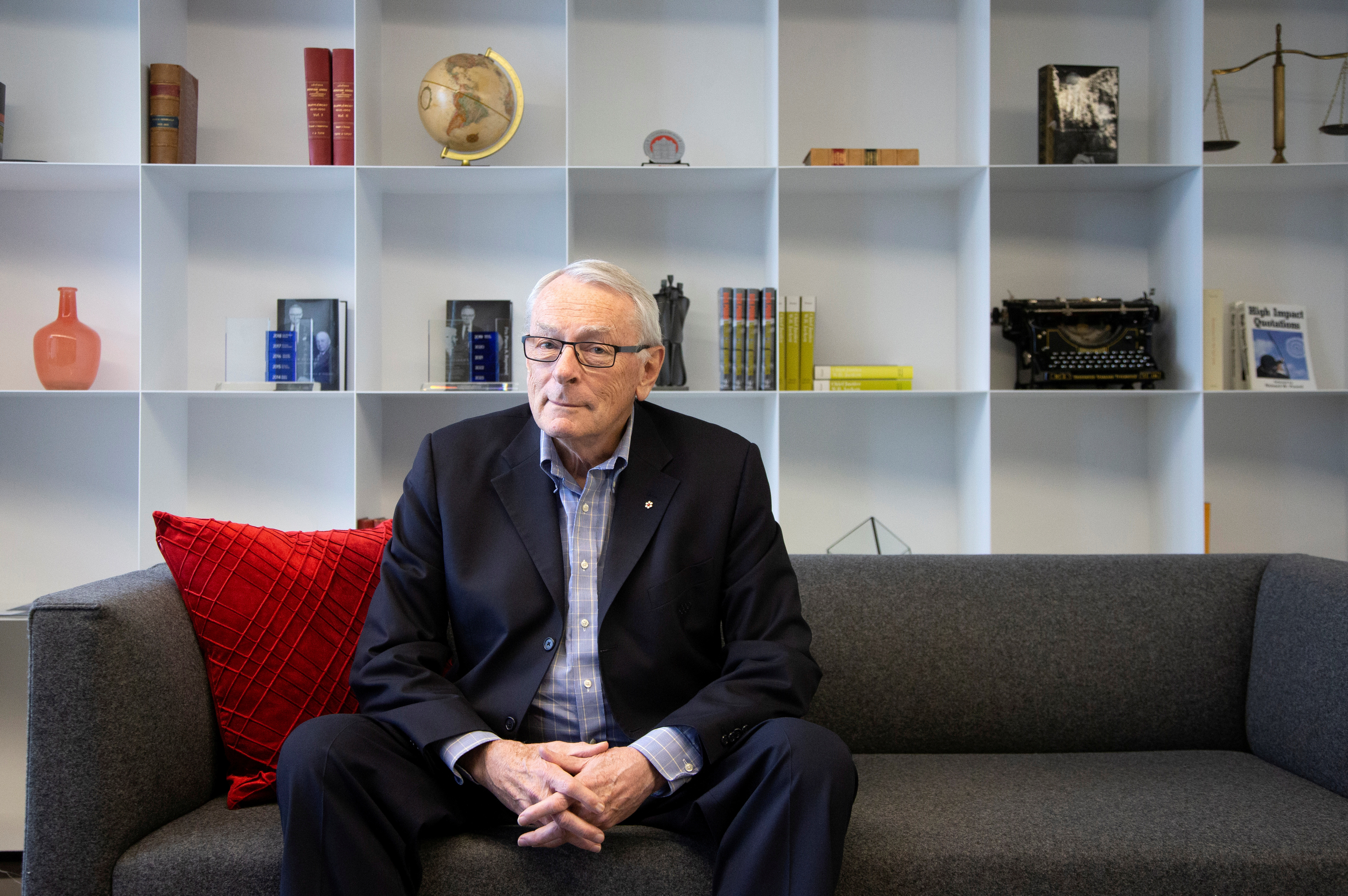 FILE PHOTO: International Olympic Committee (IOC) member Dick Pound, poses in his offices in Montreal, Quebec, Canada February 26, 2020.  REUTERS/Christinne Muschi/File Photo
