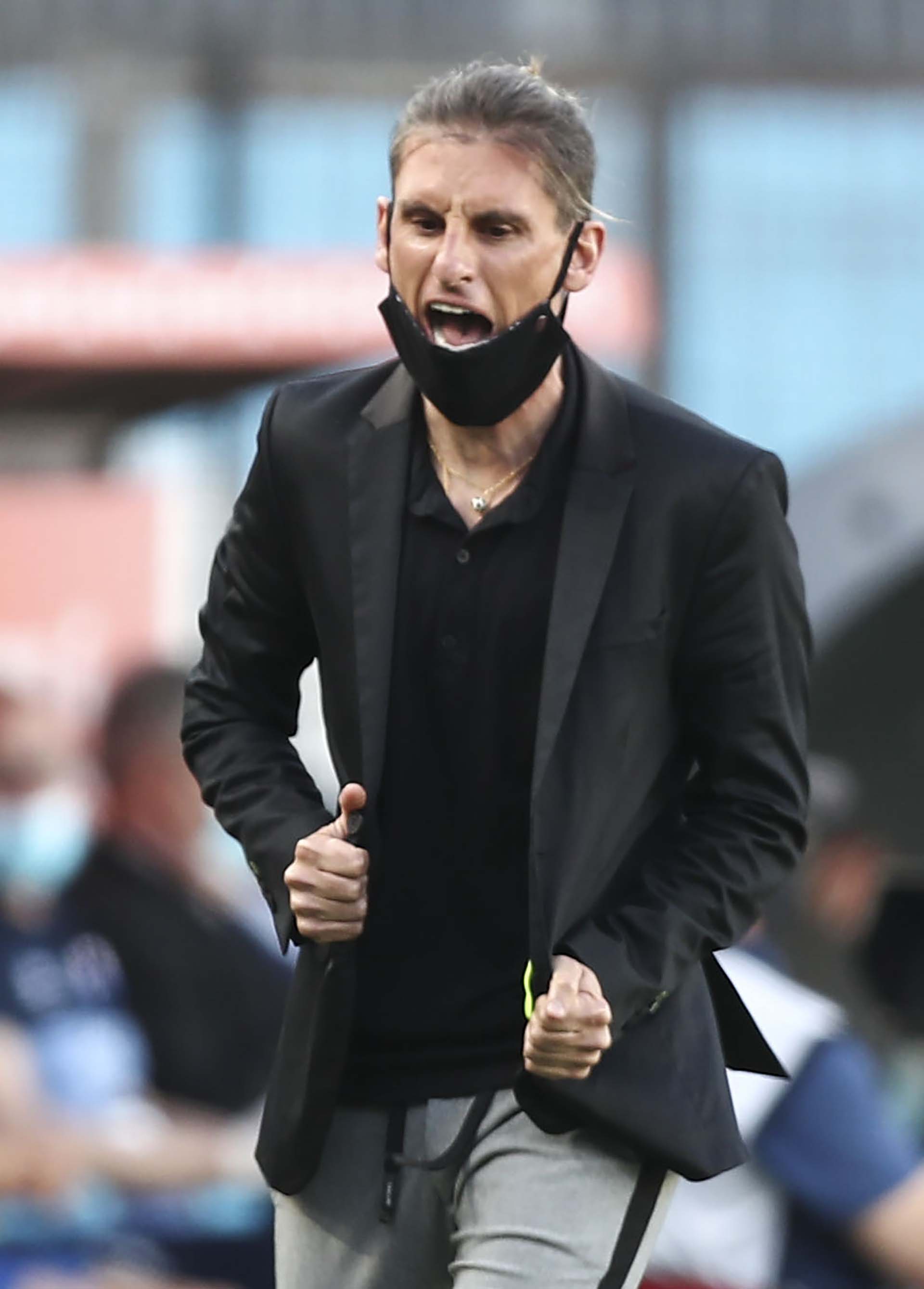 El particular look de Sebastián Beccacece, entrenador de Racing: jogging y saco (AGUSTIN MARCARIAN / POOL / AFP)