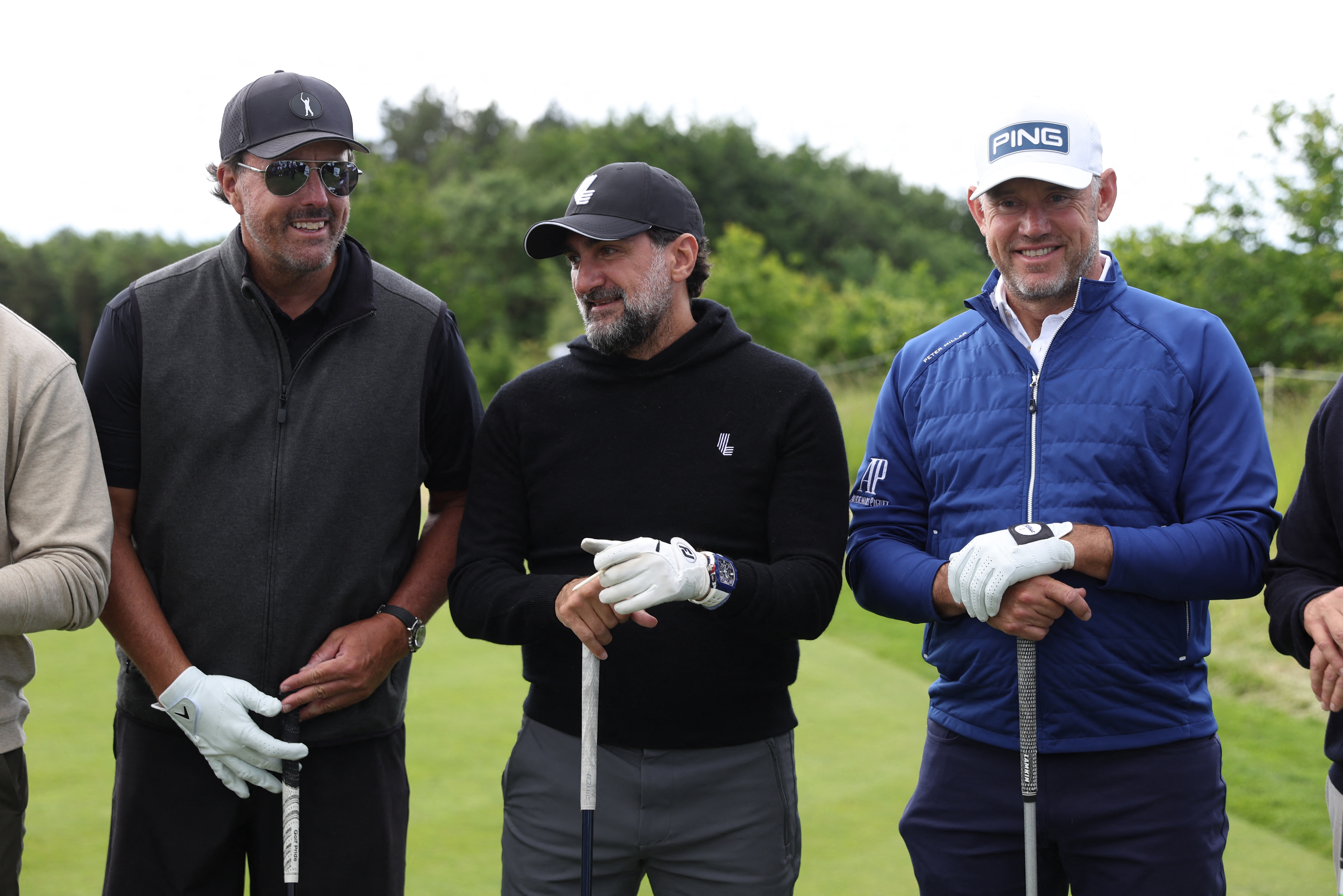 Golf - The inaugural LIV Golf Invitational - Centurion Club, Hemel Hempstead, St Albans, Britain - June 8, 2022 Phil Mickelson of the U.S. and England's Lee Westwood pose with Newcastle United chairman Yasir Al-Rumayyan before the Pro-Am Action Images via Reuters/Paul Childs