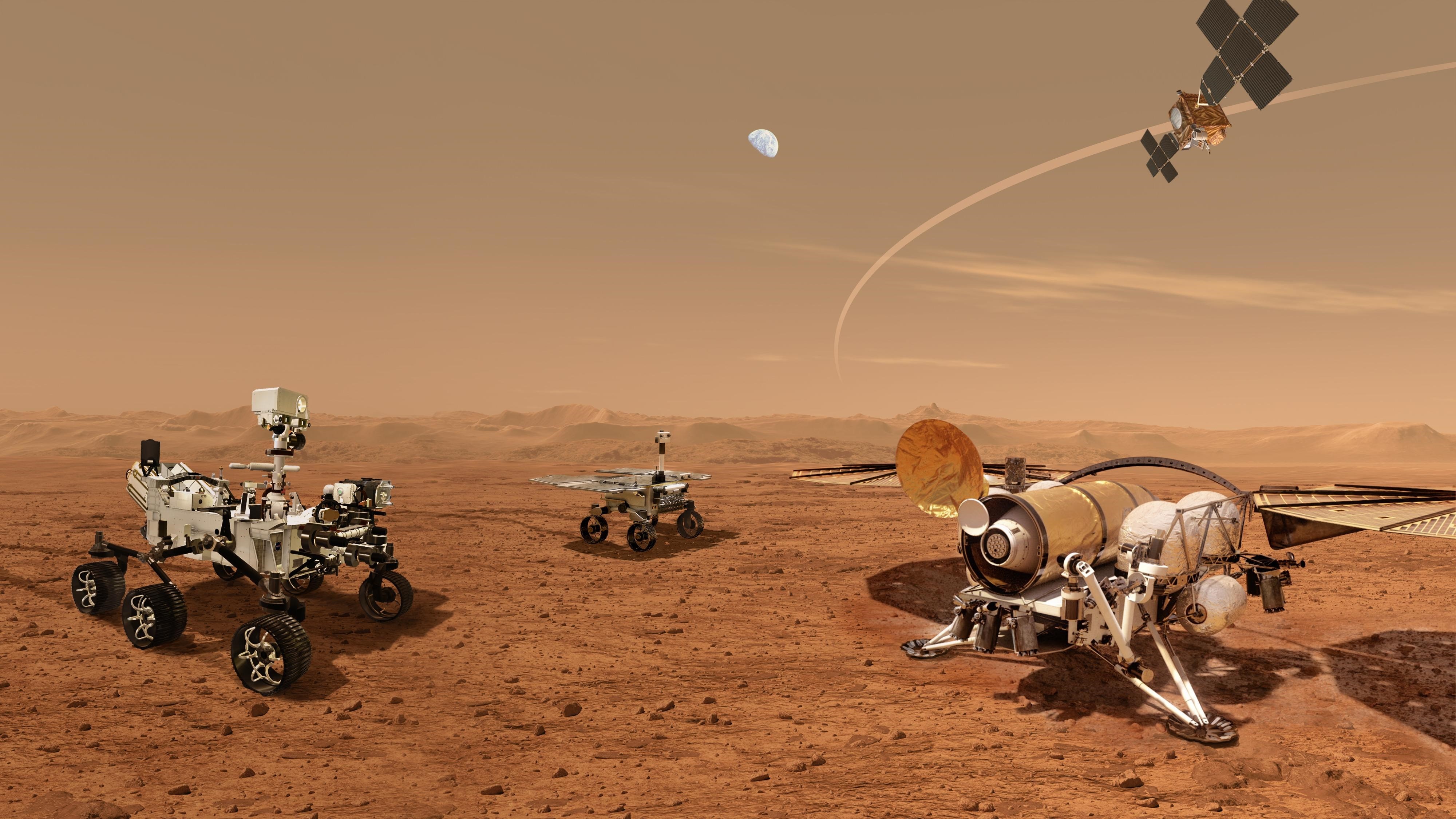 La NASA ha rilasciato l'aspetto di un gruppo di robot futuristici che lavorano insieme per trasportare campioni dalla superficie marziana raccolti dal rover Mars Perseverance.  (NASA/ESA/JPL-CALTECH)
