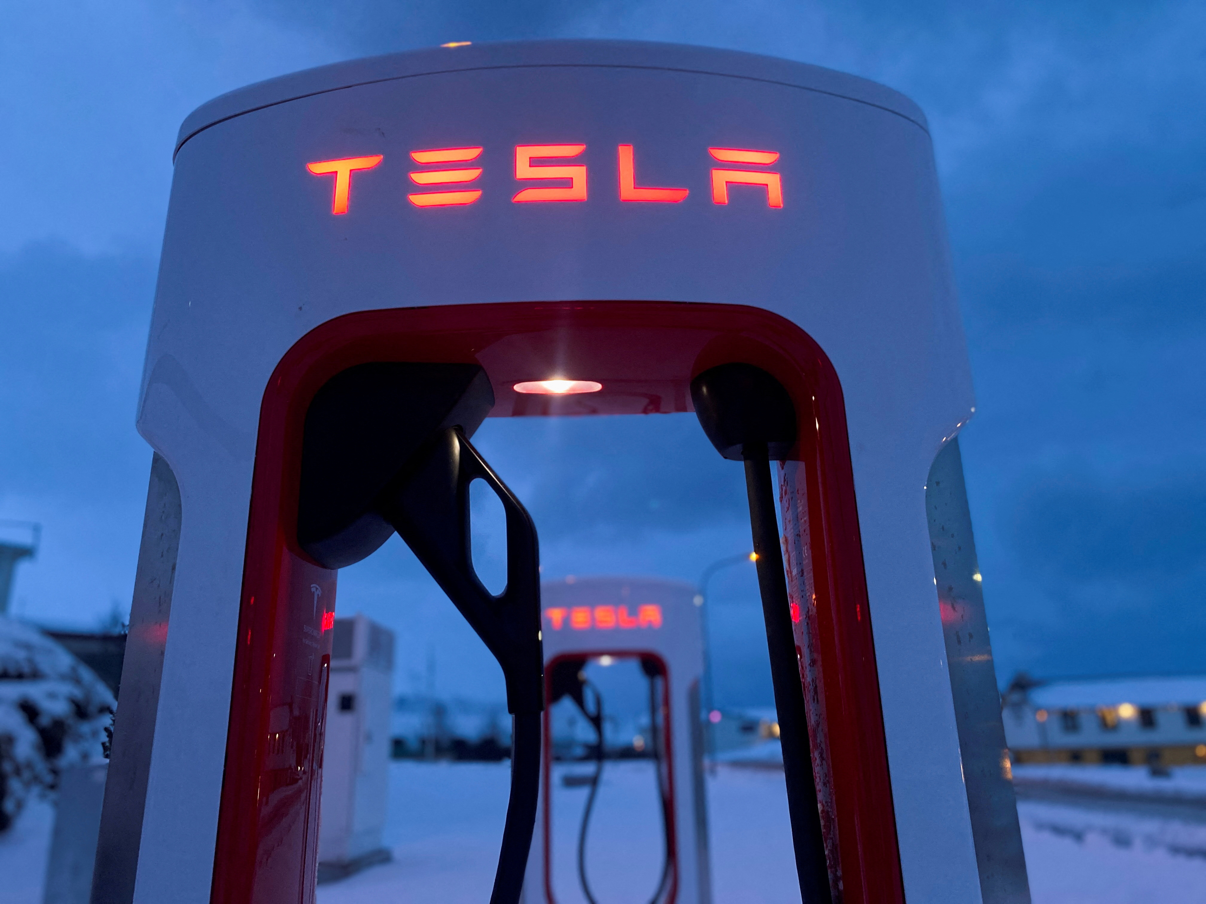 Tesla electric car chargers are seen in winter in Höfn, Iceland, February 16, 2022.  REUTERS/Nacho Doce/File