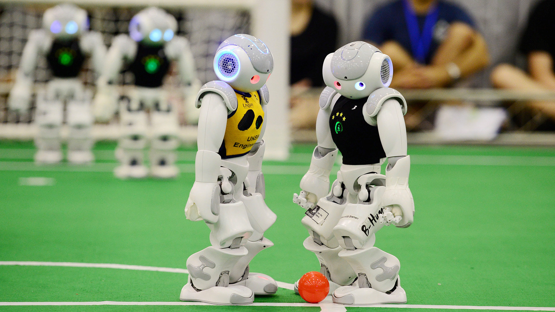 Mandatory Credit: Photo by Shutterstock (4913994d)Robots of Australian team UNSW (University of New South Wales) in yellow and German team B-Human competeRoboCup football competition, International Expo Center, Hefei, Anhui Province, China - 22 Jul 2015An Australian university team has been crowned robot world cup champions on Wednesday (22 July 2015) at the 19th RoboCup games in China after their team of automatons battled its way to glory on the football field. The world's largest robot-focused competition saw 300 teams from 47 counties or regions participate in programming a standard 58 cm-tall robot at the games in Hefei city, capital of east China's Anhui province. Once the competition starts, the robots are on their own, with the teams not allowed to interfere with the programming. In the end, New South Wales University triumphed over German team B-Human 3-1 in the final to be crowned 2015 RoboCup champions.