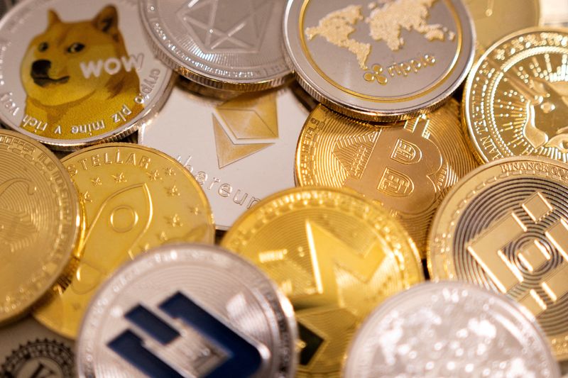 FILE PHOTO: Representations of cryptocurrencies in an illustration taken January 24, 2022. REUTERS/Dado Ruvic