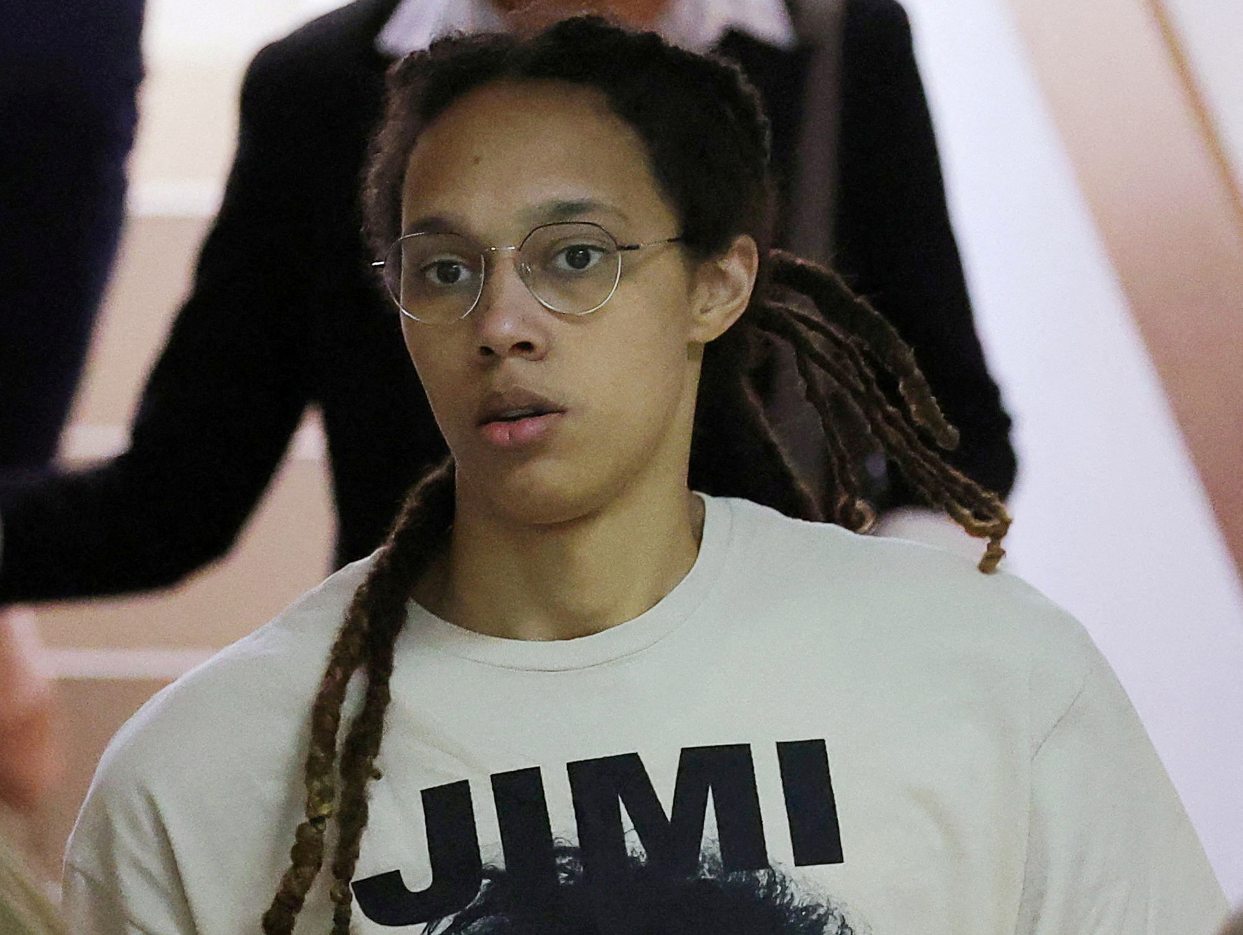 FILE PHOTO: U.S. basketball player Brittney Griner, who was detained in March at Moscow's Sheremetyevo airport and later charged with illegal possession of cannabis, is escorted before a court hearing in Khimki outside Moscow, Russia July 1, 2022. REUTERS/Evgenia Novozhenina/File Photo