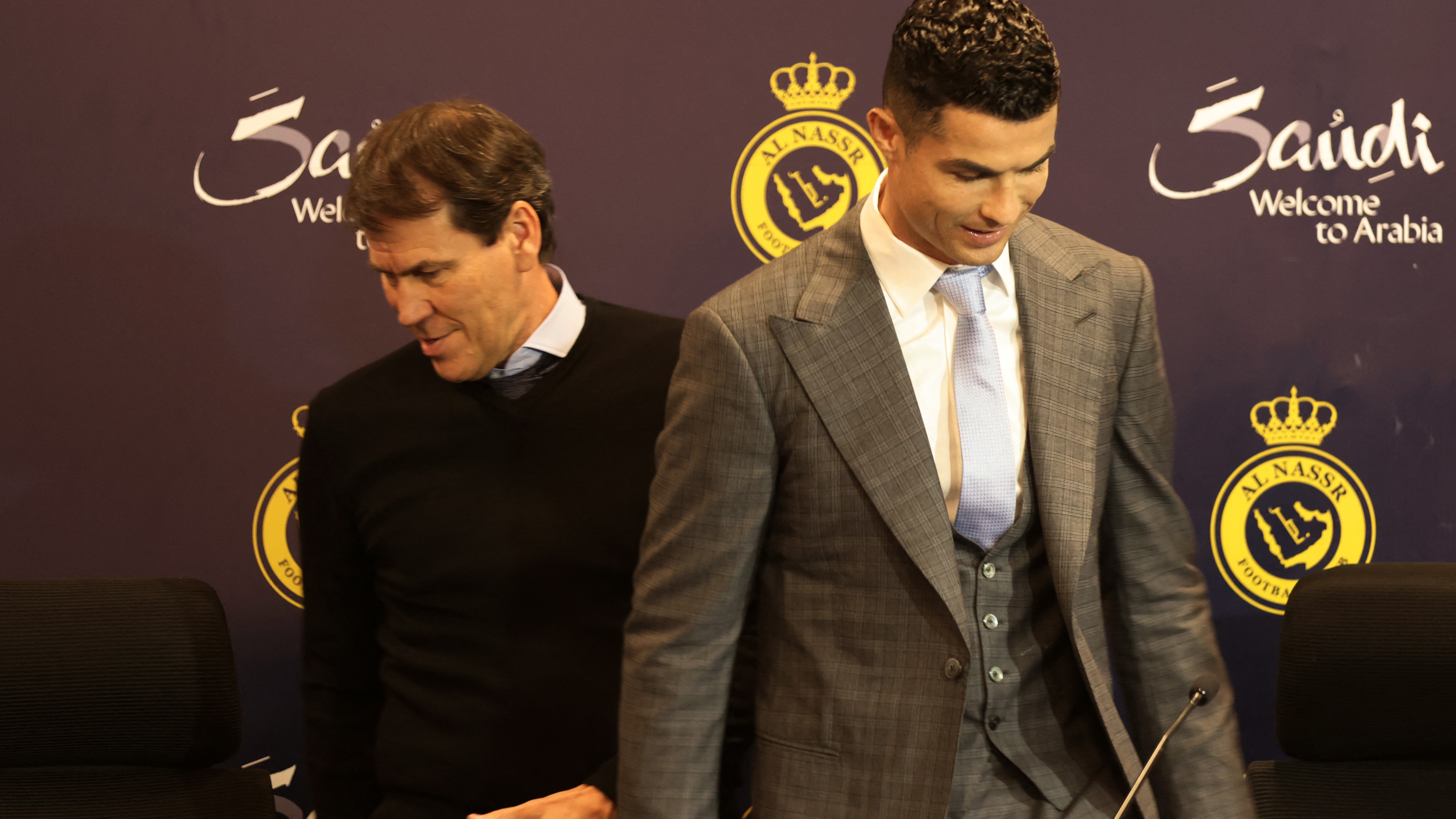 Soccer Football - Al Nassr unveil new signing Cristiano Ronaldo - Mrsool Park, Riyadh, Saudi Arabia - January 3, 2023  Al Nassr coach Rudi Garcia and new signing Cristiano Ronaldo during the press conference REUTERS/Ahmed Yosri