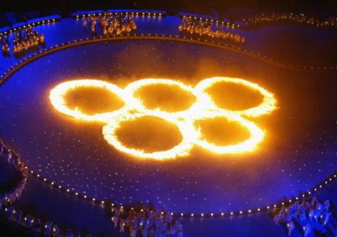 SALT LAKE CITY, UT - FEBRUARY 8:  The Olympic Rings in flames during the Opening Ceremony of the Salt Lake City Winter Olympic Games on February 8, 2002 at the Rice-Eccles Olympic Stadium in Salt Lake City, Utah. (Photo by Donald Miralle/Getty Images)