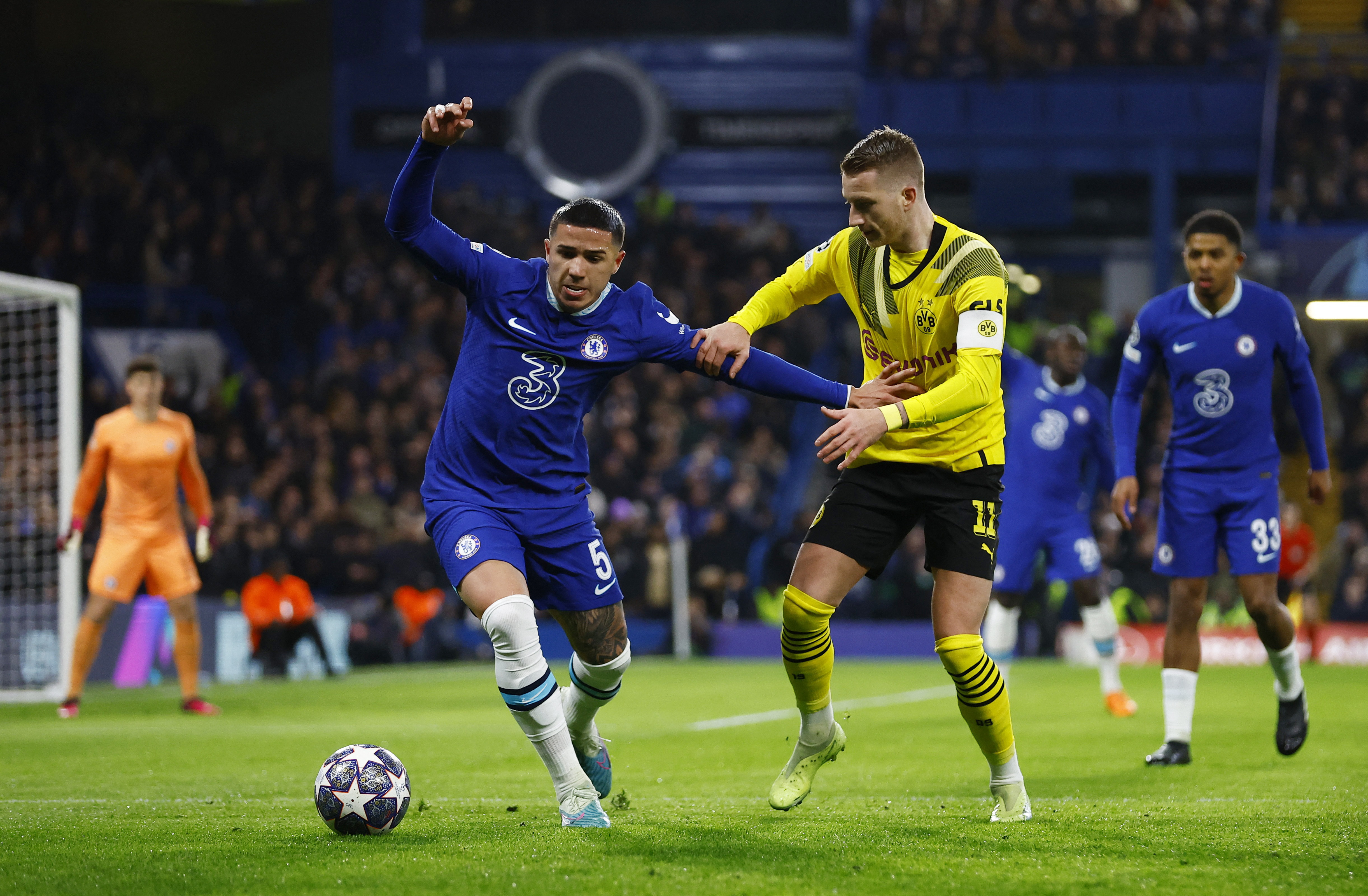 Soccer Football - Champions League - Round of 16 - Second Leg - Chelsea v Borussia Dortmund - Stamford Bridge, London, Britain - March 7, 2023 Borussia Dortmund's Marco Reus in action with Chelsea's Enzo Fernandez Action Images via Reuters/Peter Cziborra