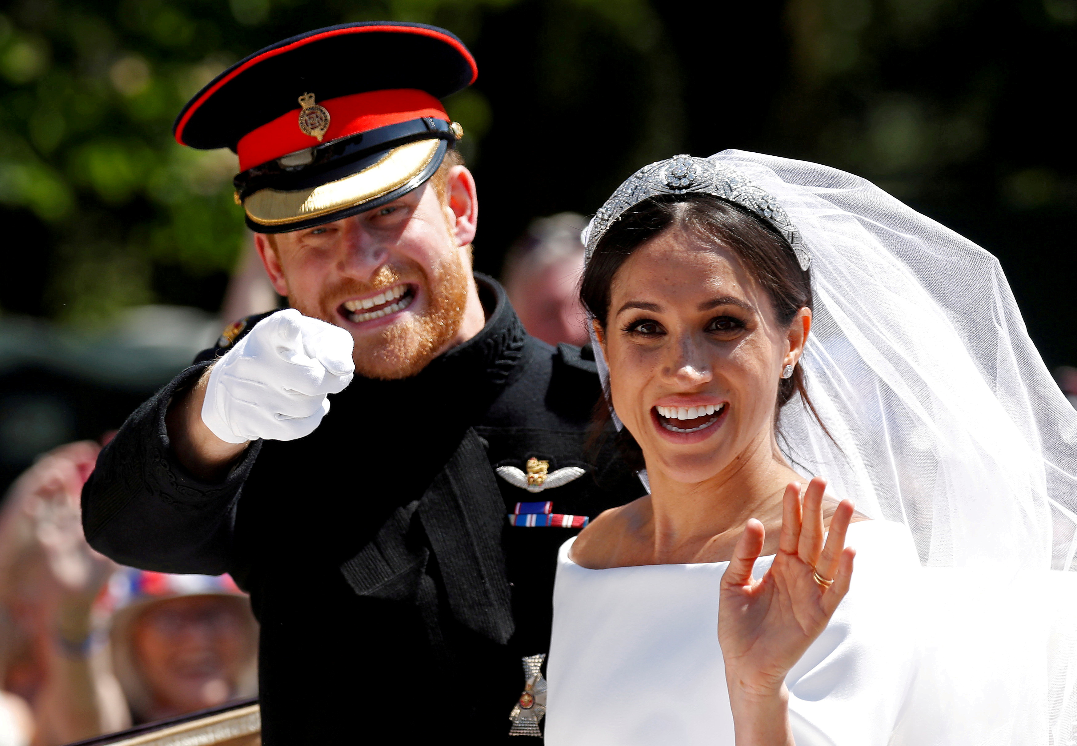 Harry y Meghan tras su boda en St George’s Chapel en el castillo de  Windsor, el 19 de mayo de 2018 (Reuters)