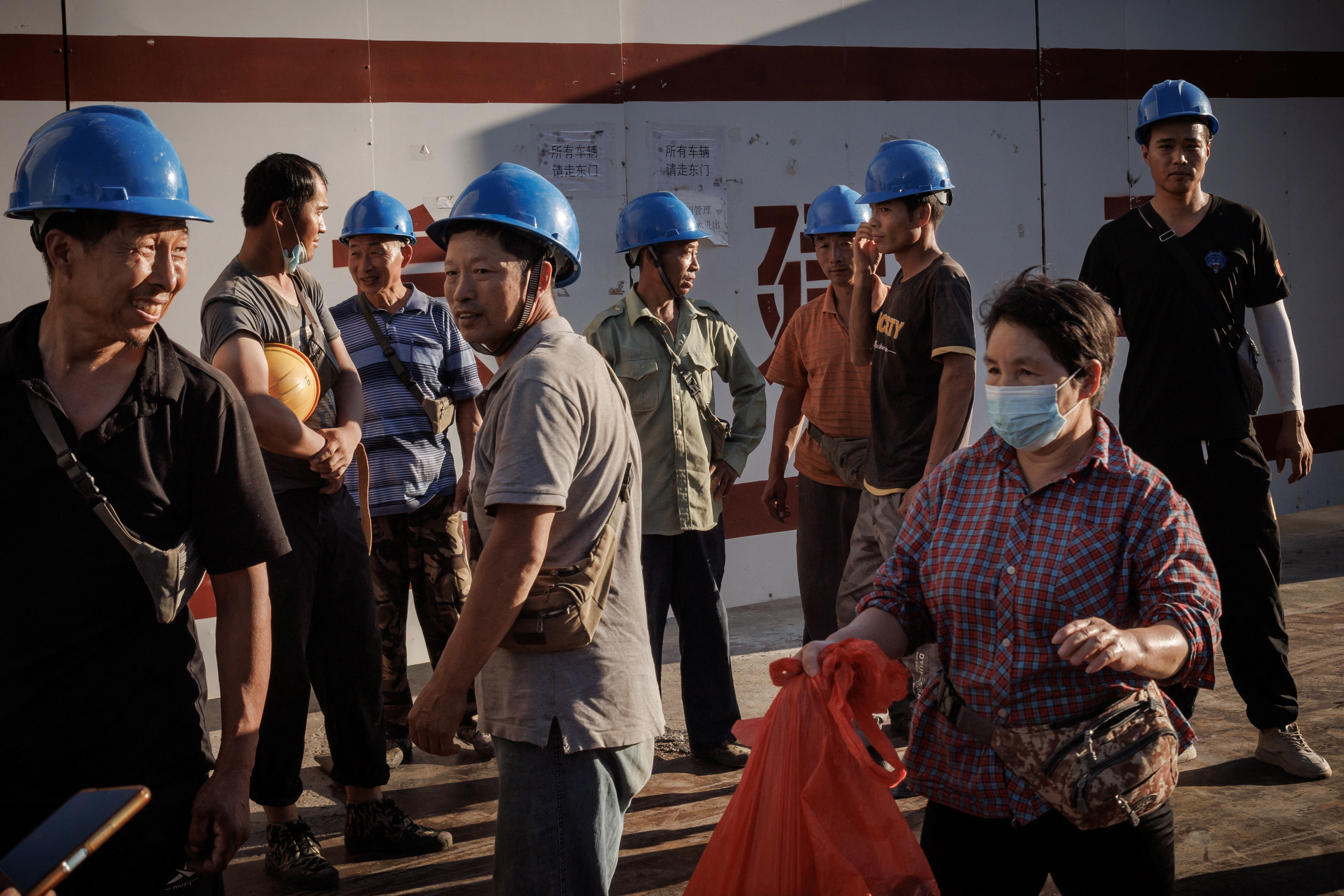 Construction workers in Beijing (Reuters)