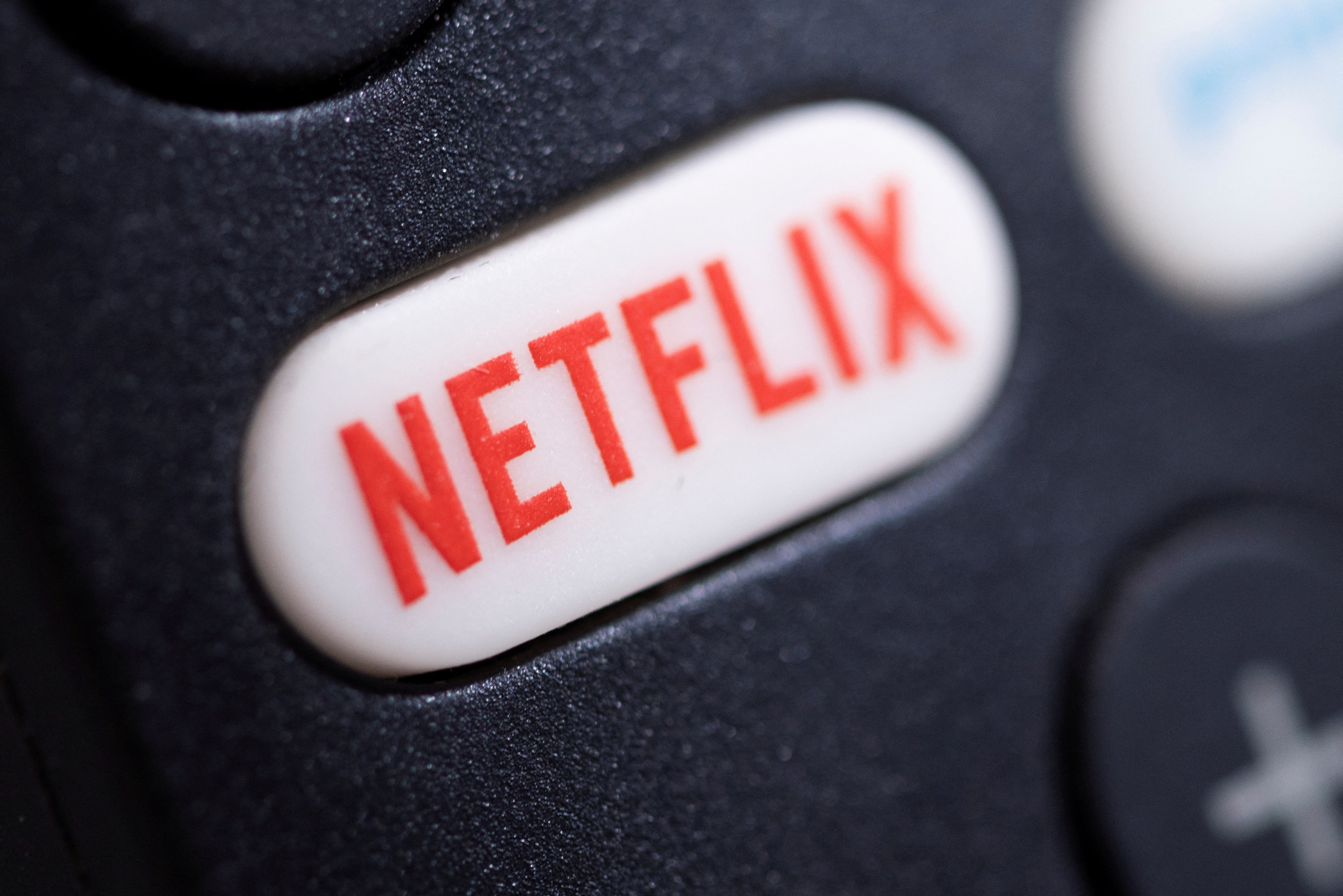 FILE PHOTO: The Netflix logo is seen on a TV remote controller, in this illustration taken January 20, 2022. REUTERS/Dado Ruvic/Illustration/File Photo