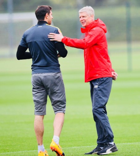 Wenger y Dibu, en el Arsenal