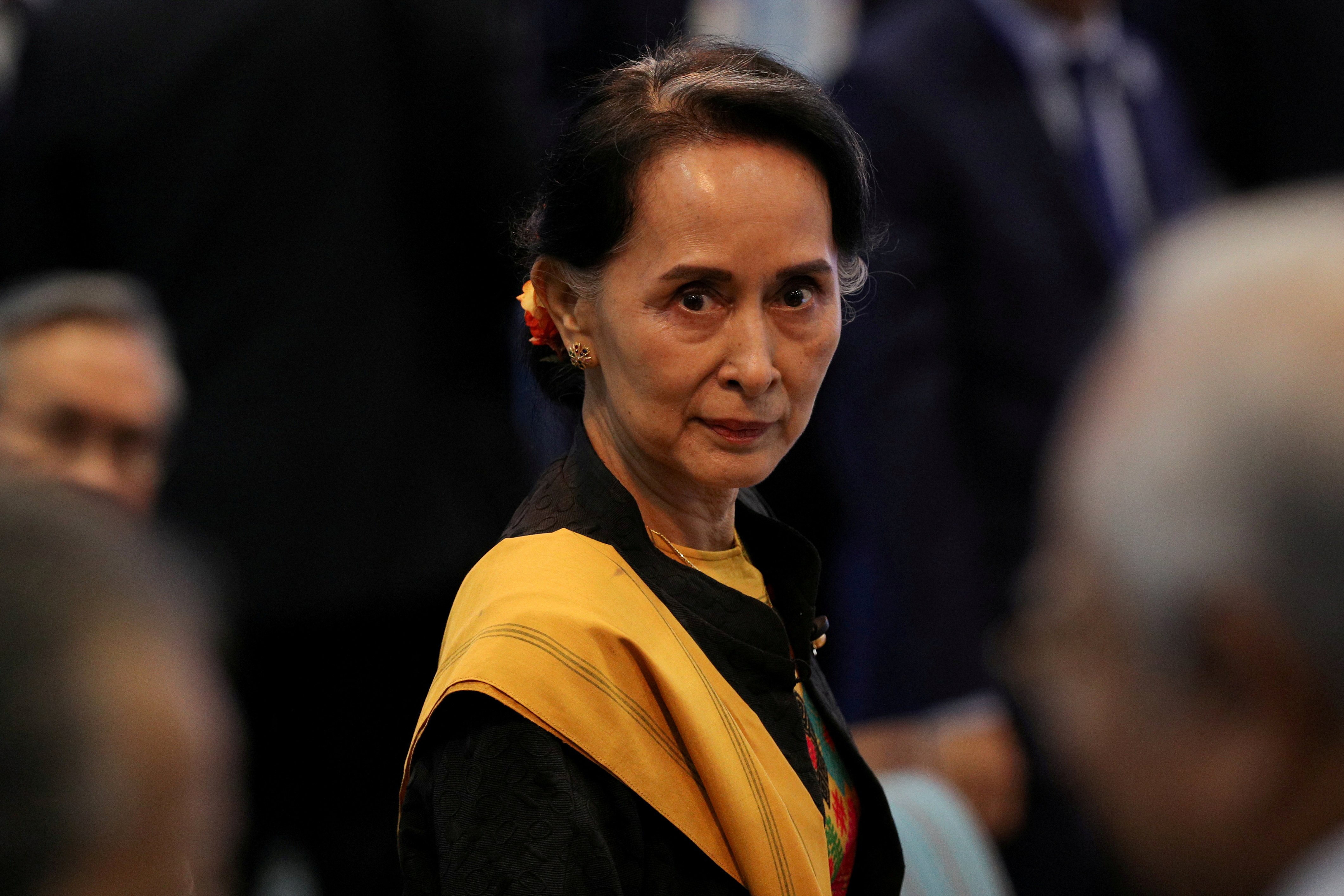 FILE PHOTO: Myanmar State Counselor Suu Kyi attends the opening session of the 31st ASEAN Summit in Manila