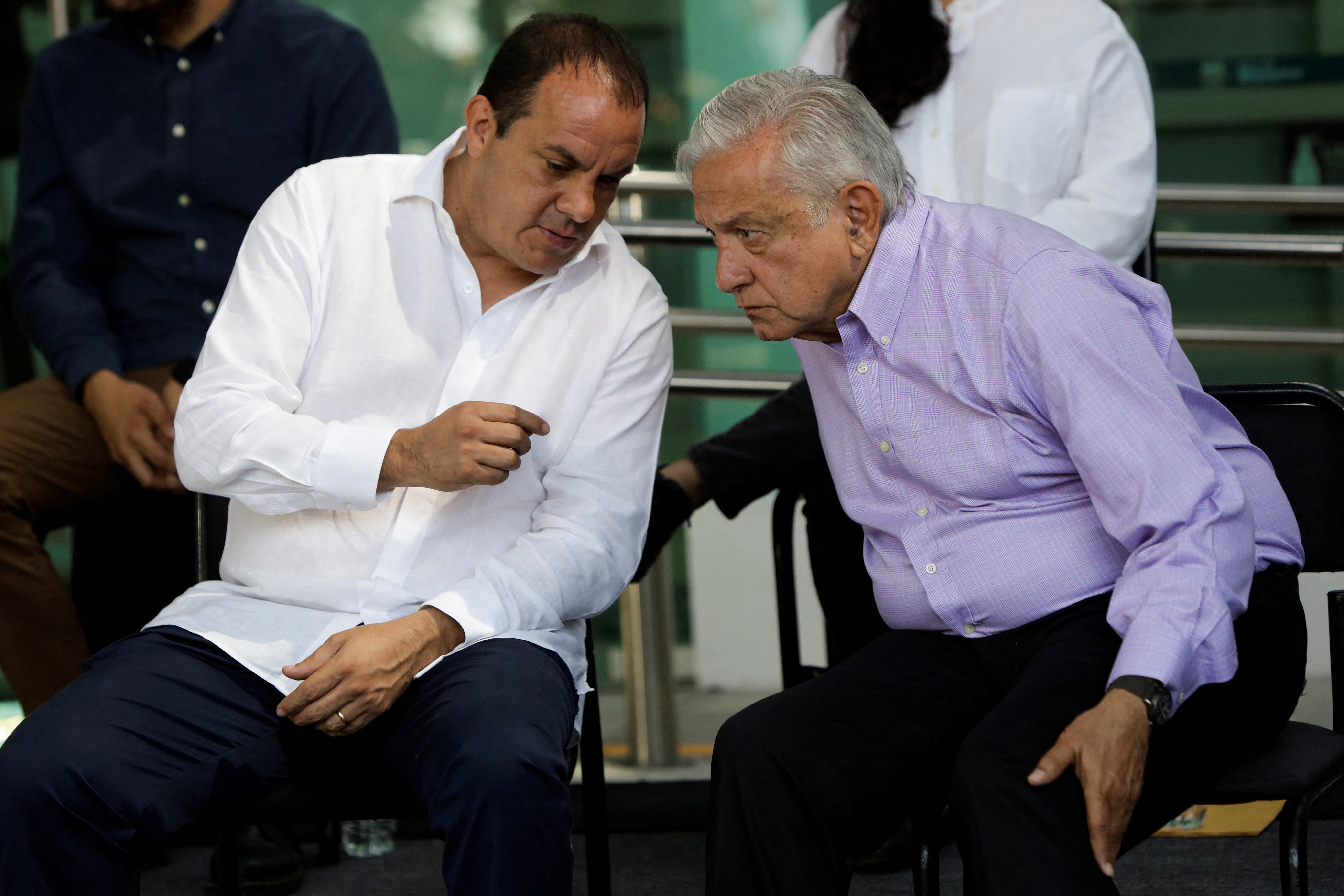 Morelos Governor and former football star Cuauhtemoc Blanco chats with Mexico's President Andres Manuel Lopez Obrador during the inauguration of a local branch of the social development bank Banco del Bienestar, in Coatlan del Rio, in Morelos state, Mexico June 19, 2022. To match Special Report MEXICO-POLITICS/BLANCO REUTERS/Luis Cortes