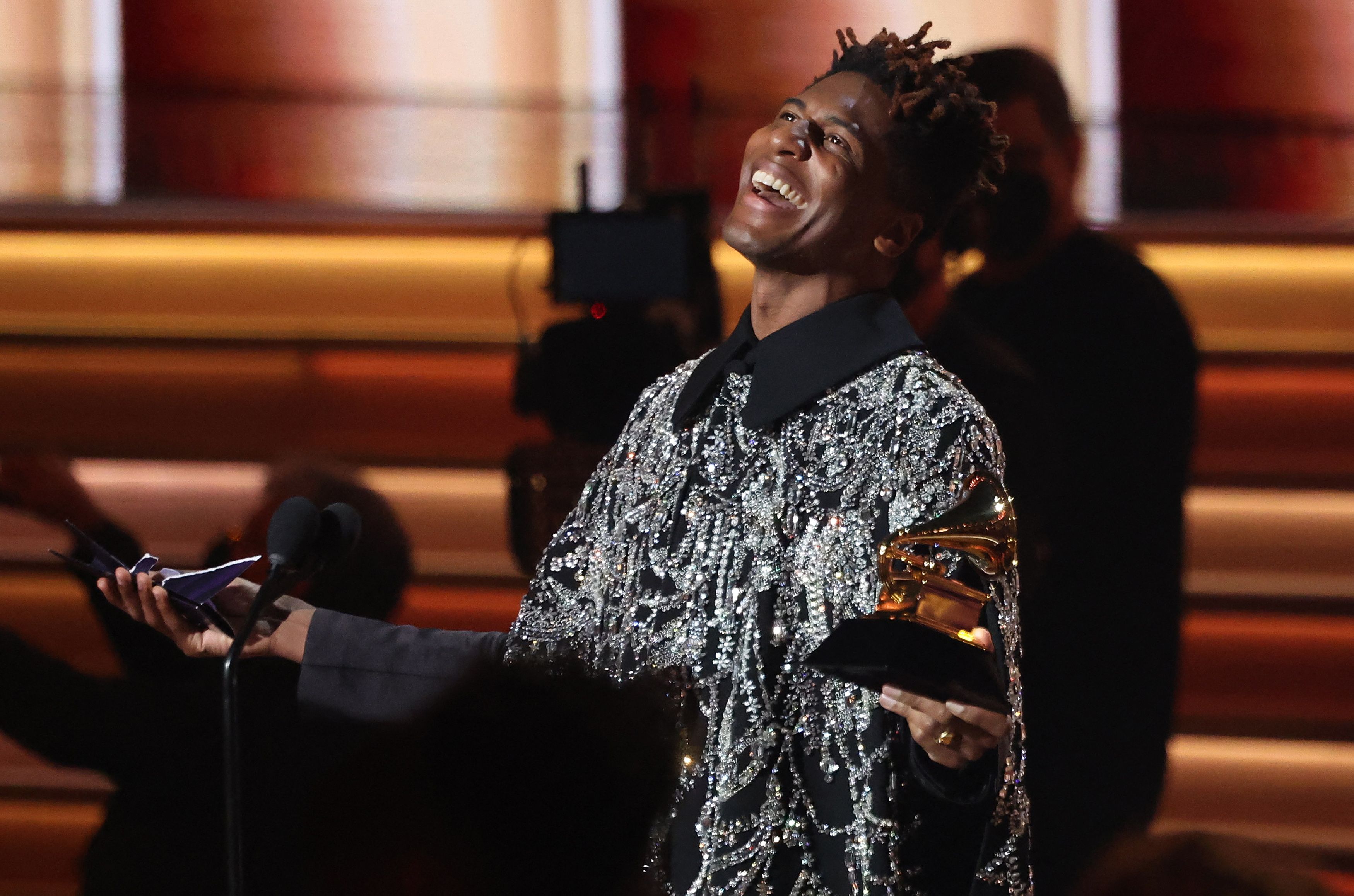 Jon Batiste accepts the Grammy award for Album of the Year for "We Are" during the 64th Annual Grammy Awards show in Las Vegas, Nevada, U.S. April 3, 2022.    REUTERS/Mario Anzuoni