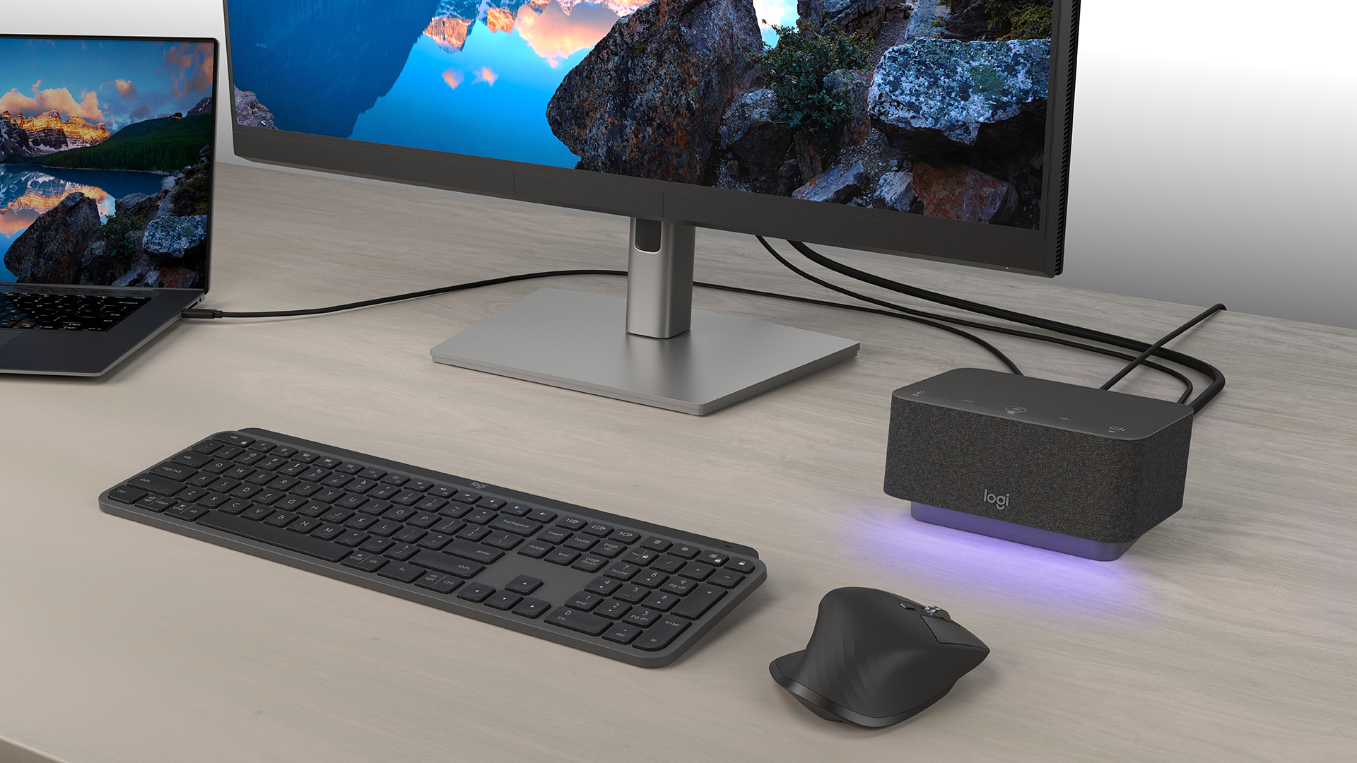 By connecting the Logitech wireless keyboard and mouse through the Unifying receptor, the USB ports are now free for other devices such as the webcam, personal microphone, and light ring (Credit: Logitech Press)