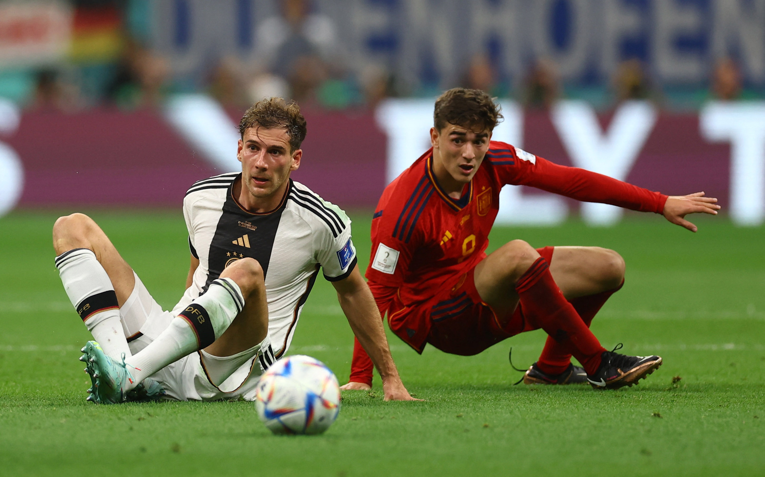 Soccer Football - FIFA World Cup Qatar 2022 - Group E - Spain v Germany - Al Bayt Stadium, Al Khor, Qatar - November 27, 2022 Germany's Leon Goretzka in action with Spain's Gavi REUTERS/Kai Pfaffenbach