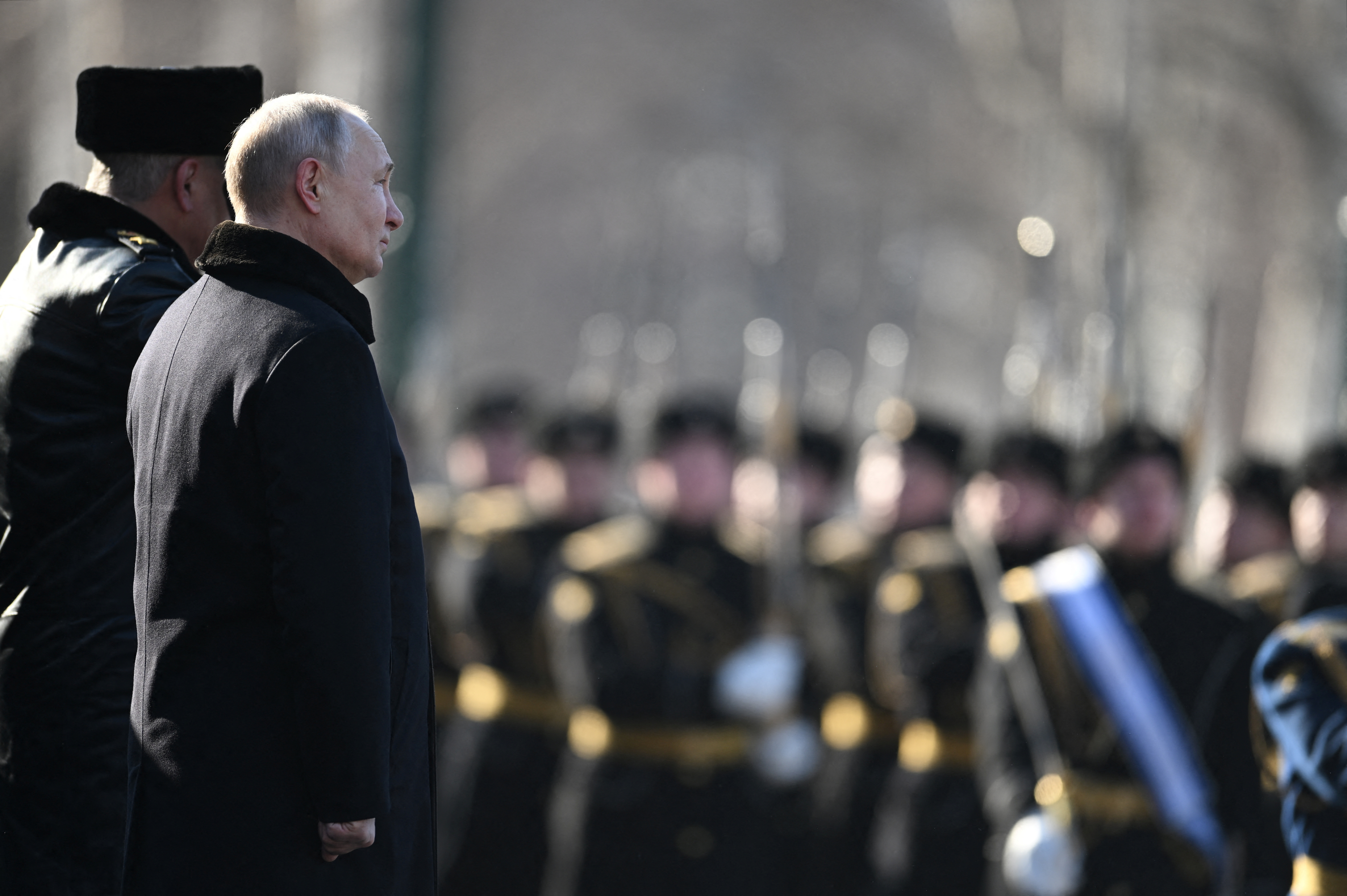 Russian President Vladimir Putin takes part in a ceremony on the Defender of the Fatherland Day in Moscow