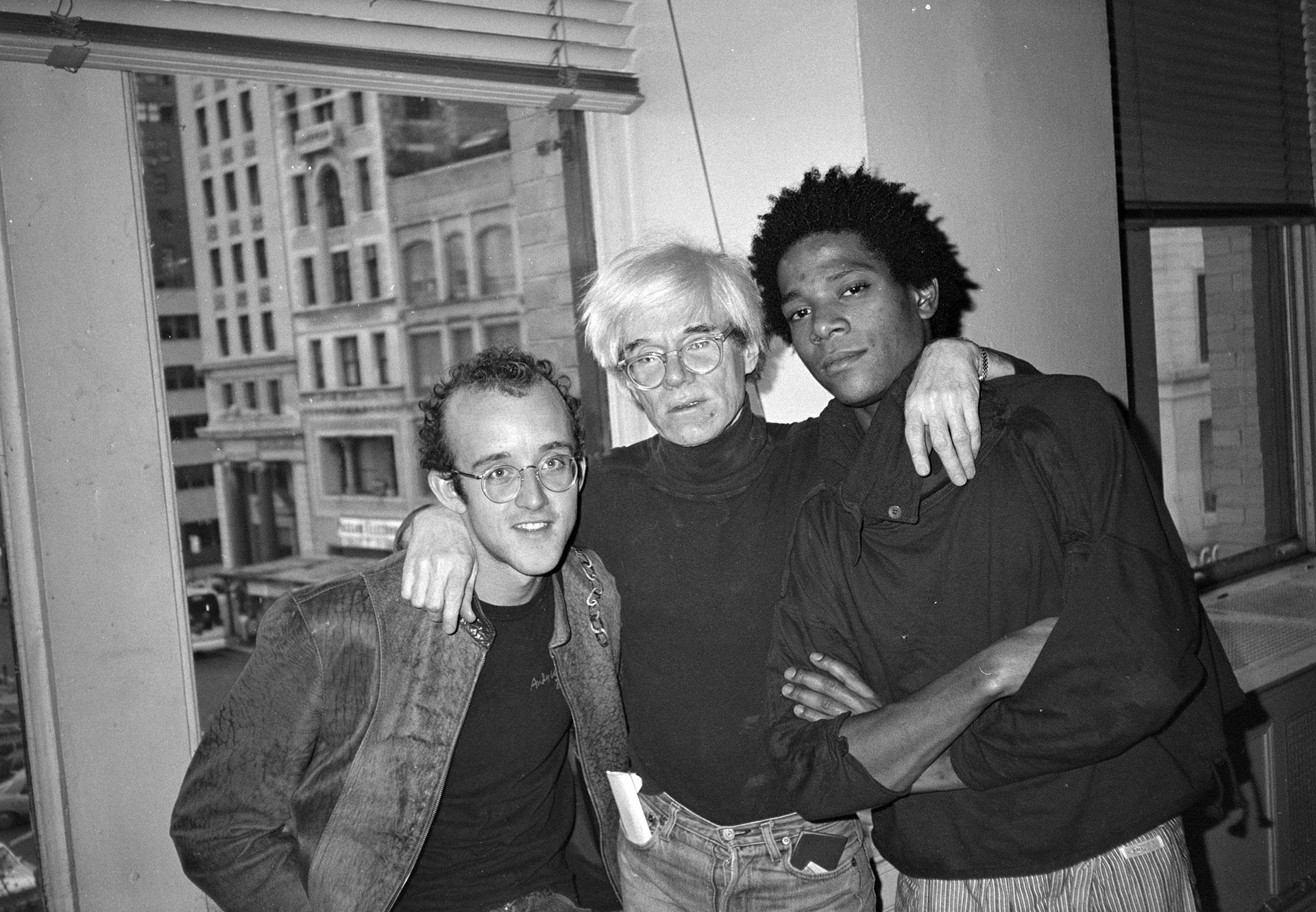 Andy Warhol (centro) con Basquiat (a la derecha) (Télam)