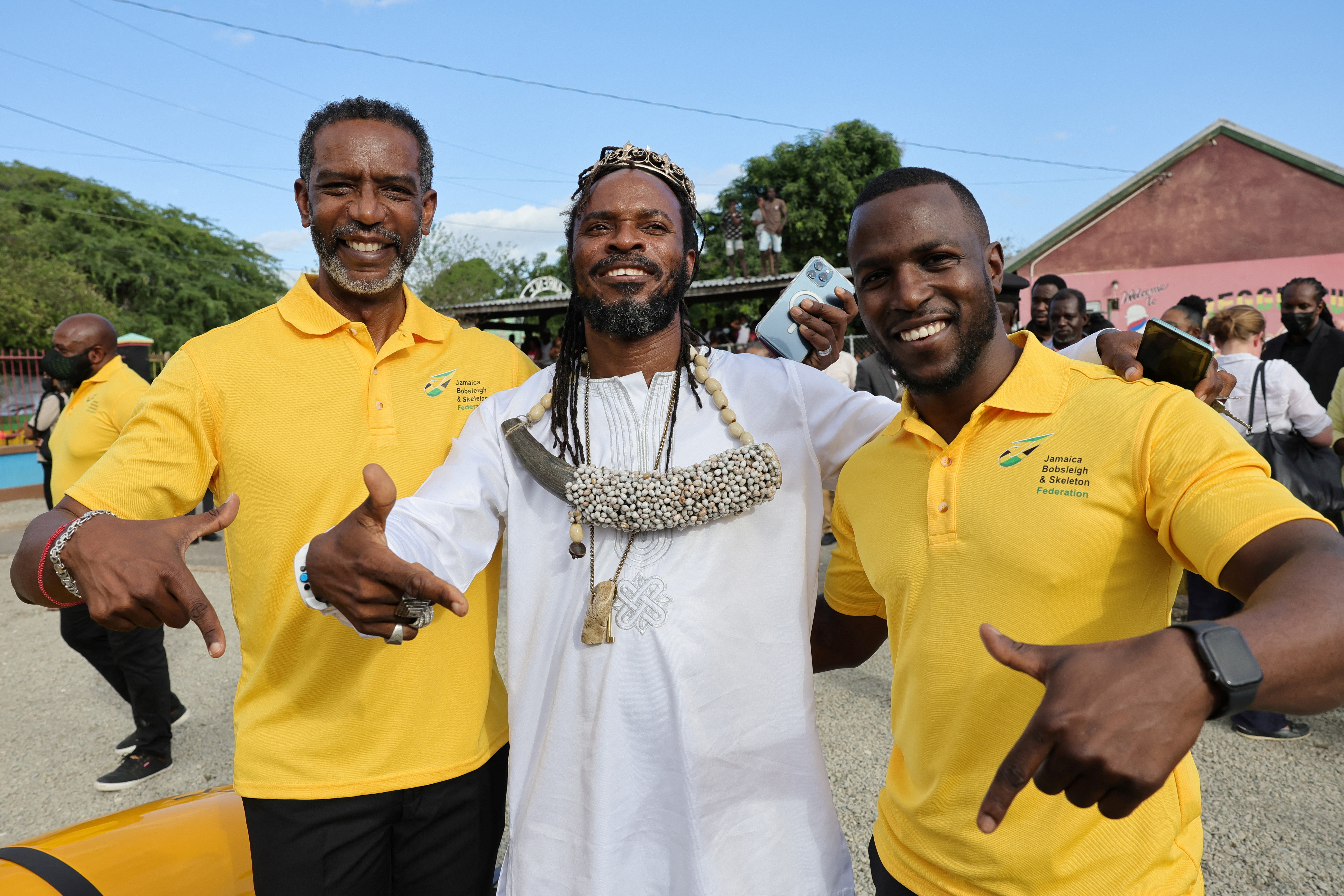 Members of Jamaica's National bobsleigh team Chris Stokes and Rolando Reid visit Trench Town, the birthplace of reggae music, on the fourth day of the Platinum Jubilee Royal Tour of the Caribbean by Prince William and Catherine, Duchess of Cambridge, in Kingston, Jamaica March 22, 2022. Chris Jackson/Pool via REUTERS