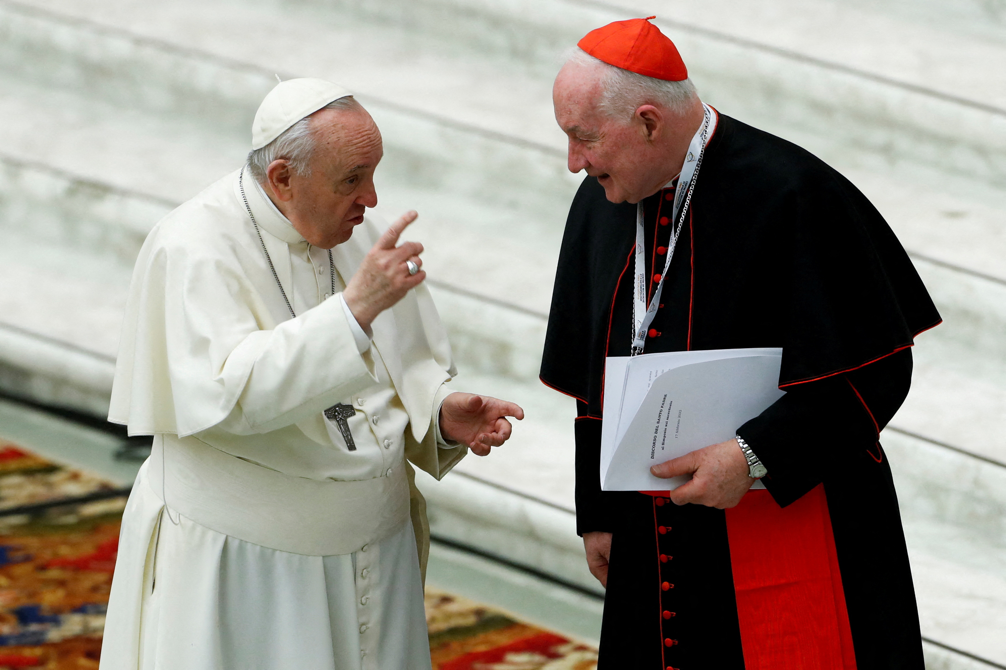 FILE PHOTO: Pope Francis talks to Cardinal Marc Ouellet of Canada
