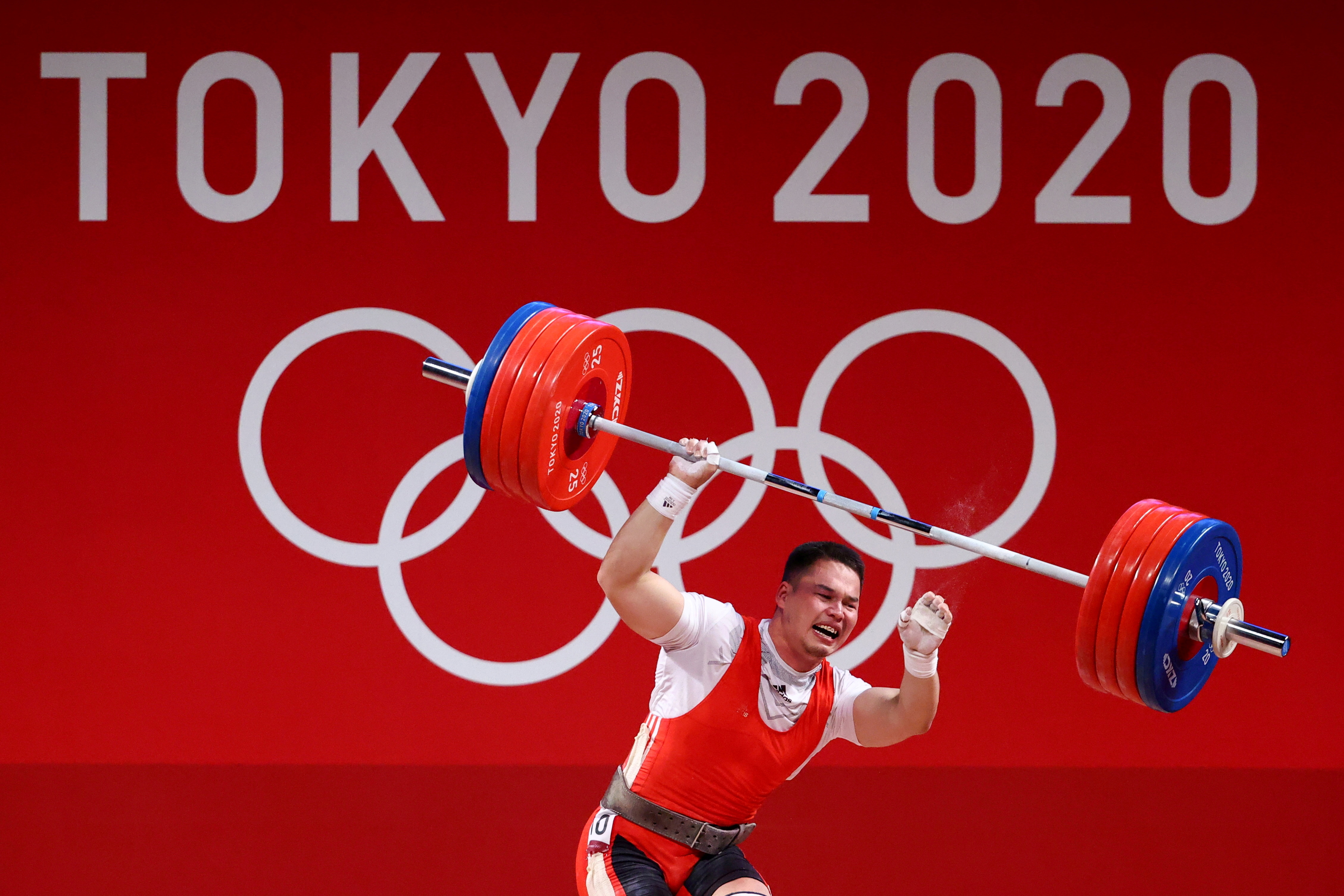 Tokyo 2020 Olympics - Weightlifting - Men's 96kg - Group A - Tokyo International Forum, Tokyo, Japan - July 31, 2021. Bekdoolot Rasulbekov of Kyrgyzstan reacts as he fails a lift. REUTERS/Edgard Garrido/File photo       SEARCH "BEST OF THE TOKYO OLYMPICS" FOR ALL PICTURES. TPX IMAGES OF THE DAY.