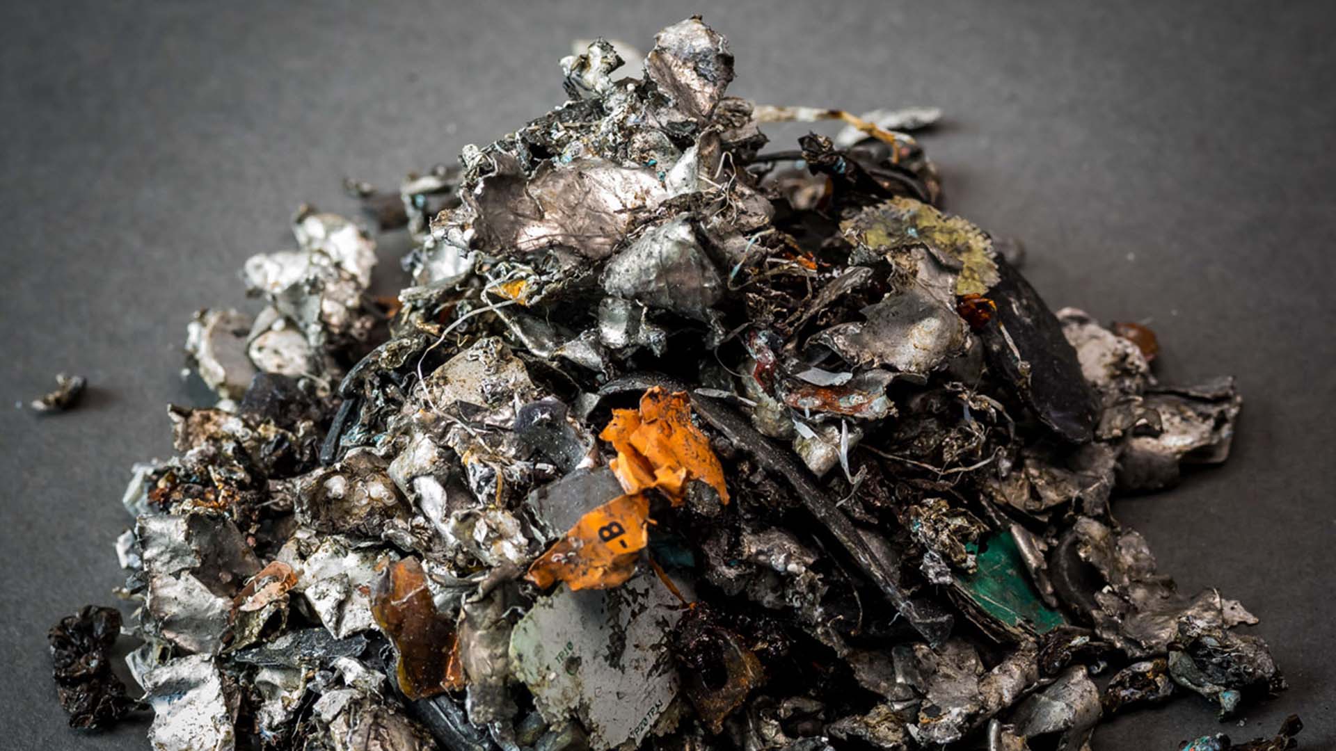 Battery recycling begins with disassembly and material separation, followed by shredding, which is called "Black Mass"