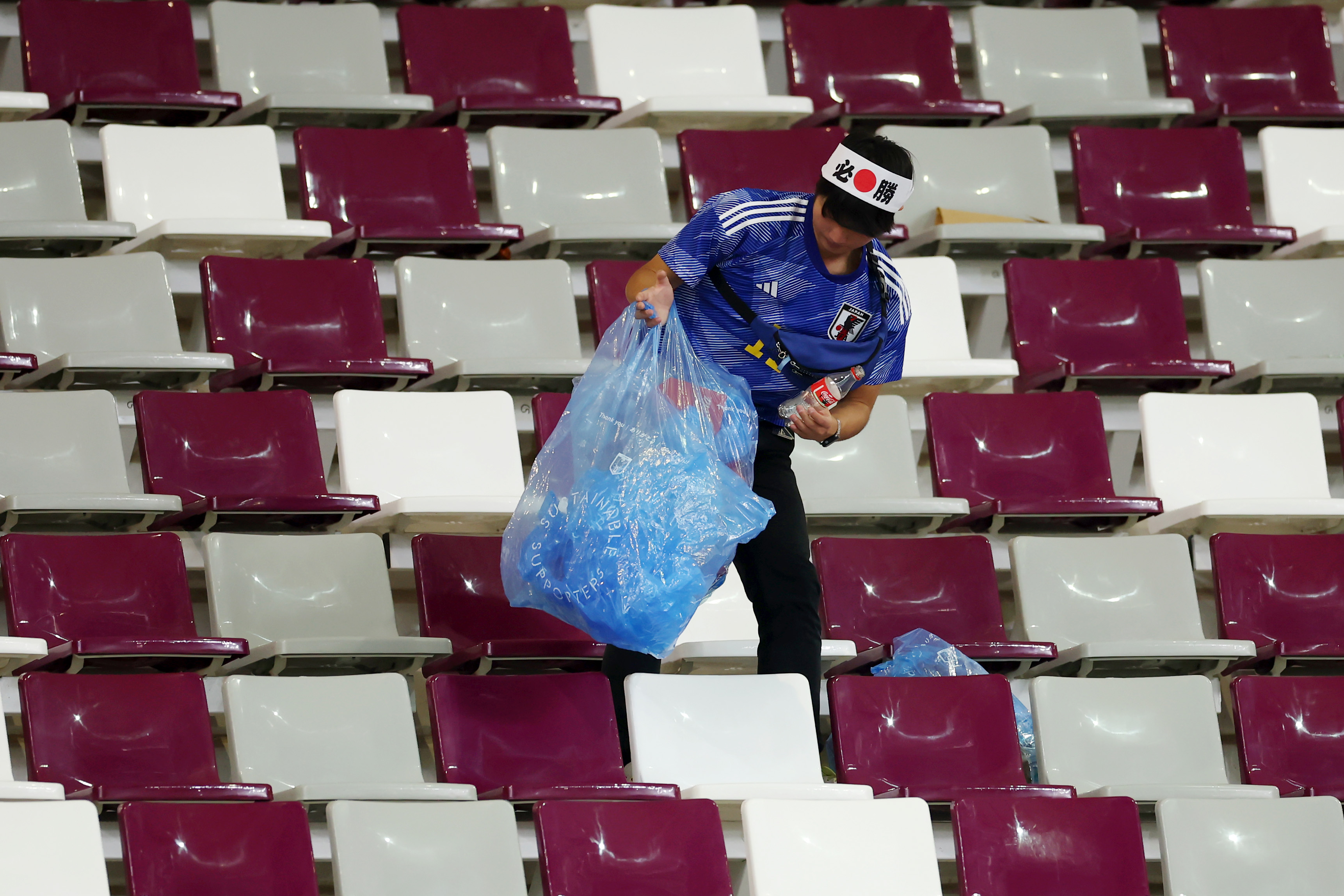 The fans took bags and collected all the waste from their sector of the stadium (Photo: Getty)