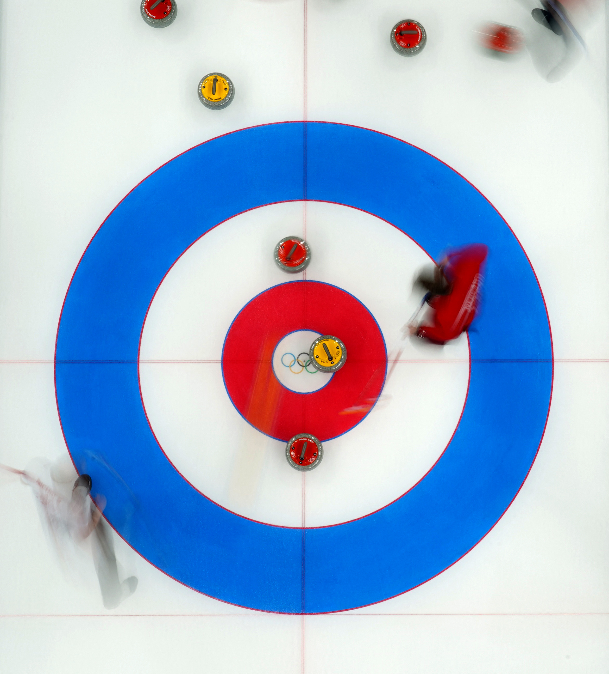 2022 Beijing Olympics - Curling - Men's Round Robin Session 2 - Norway v Canada - National Aquatics Center, Beijing, China - February 10, 2022. Athletes in action. REUTERS/Evelyn Hockstein