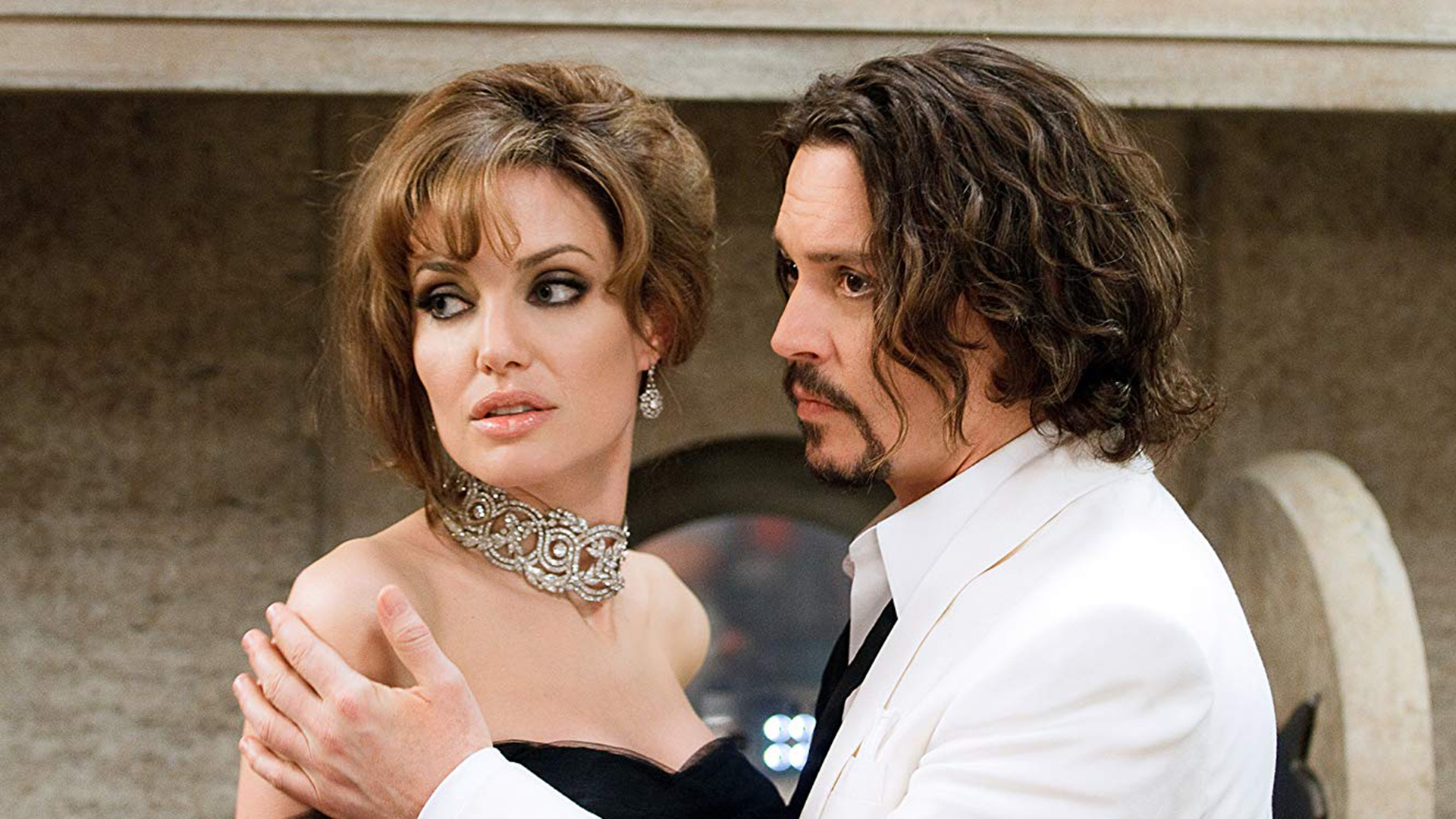 Angelina Jolie y Jhonny Depp, durante la participación como protagonistas de la película "El Turista". Al parecer el caracter de los actores detonó en una supuesta enemistad.