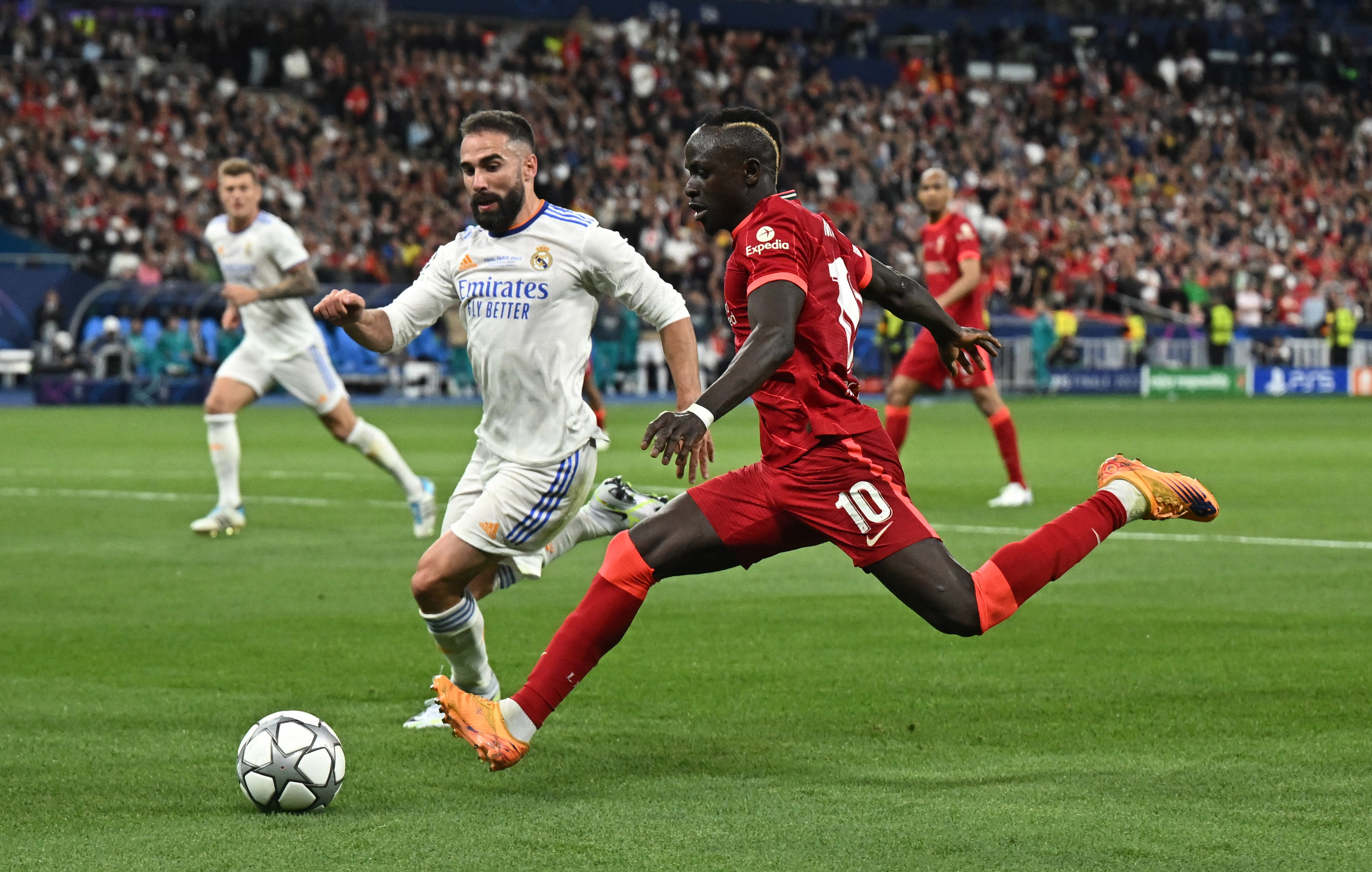 Soccer Football - Champions League Final - Liverpool v Real Madrid - Stade de France, Saint-Denis near Paris, France - May 28, 2022 Real Madrid's Dani Carvajal in action with Liverpool's Sadio Mane REUTERS/Dylan Martinez