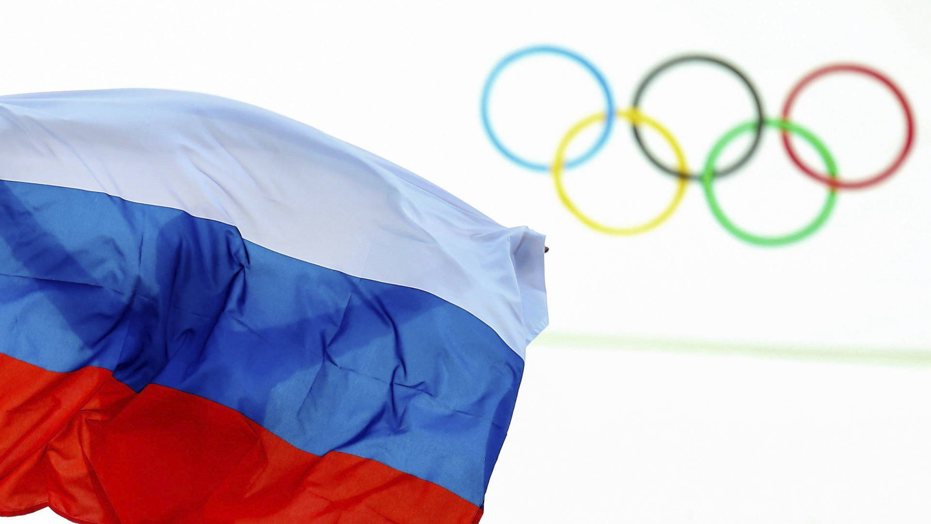 Russian flag and Olympic rings.