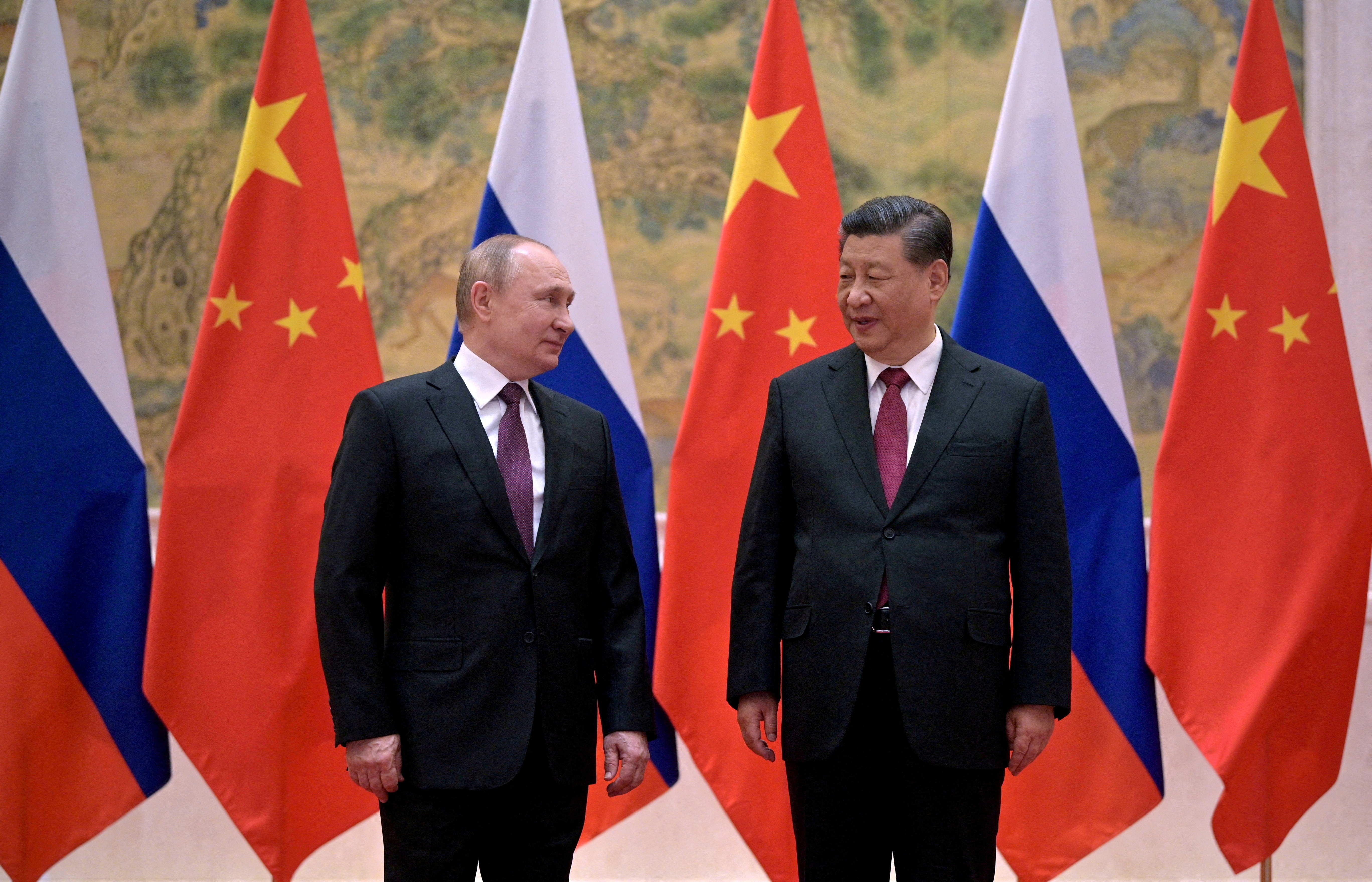 Los presidentes de Rusia y China en unno de sus escuentros previos. (Sputnik/Reuters)