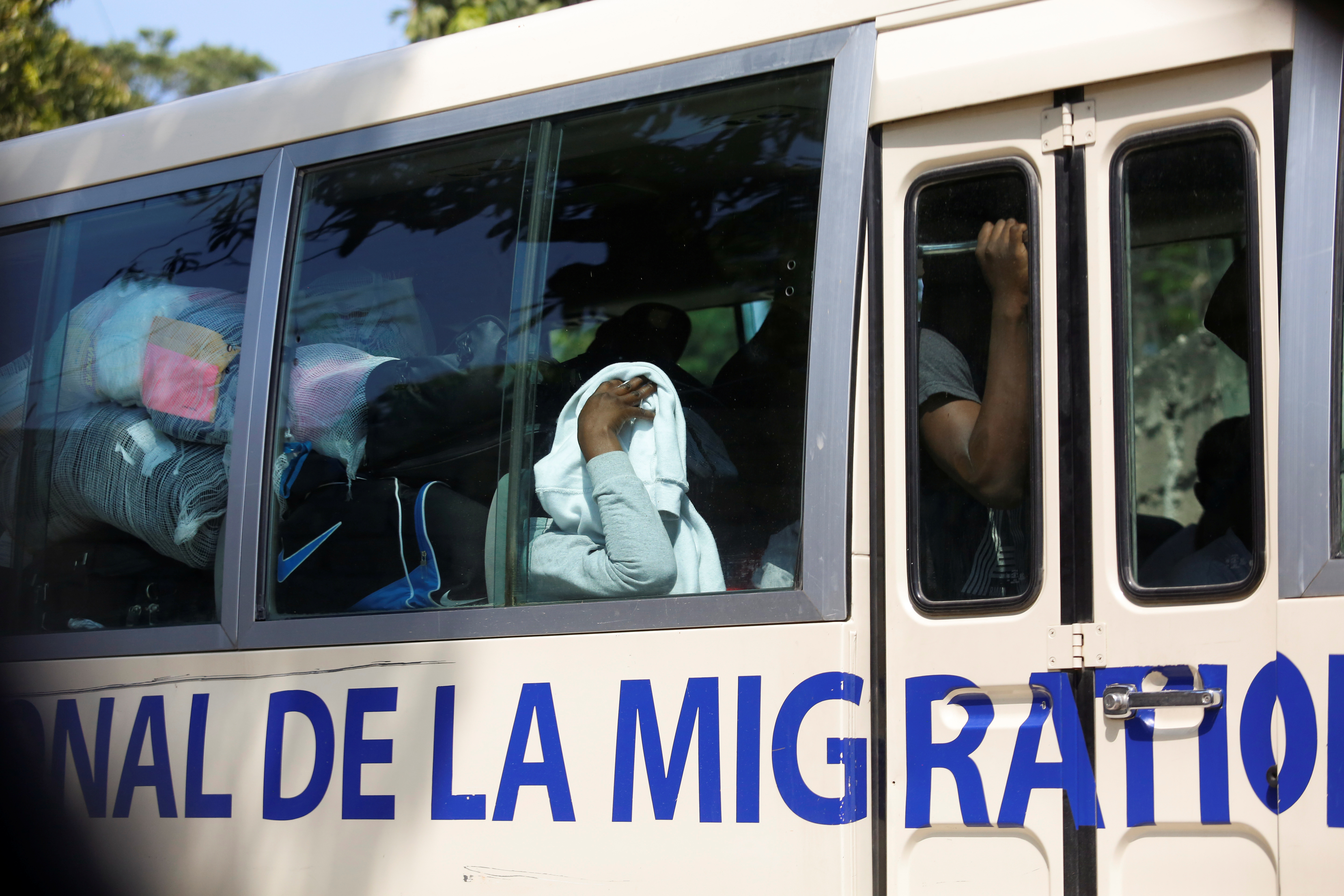 Autobús con migrantes haitianos deportados de EEUU (Reuters)