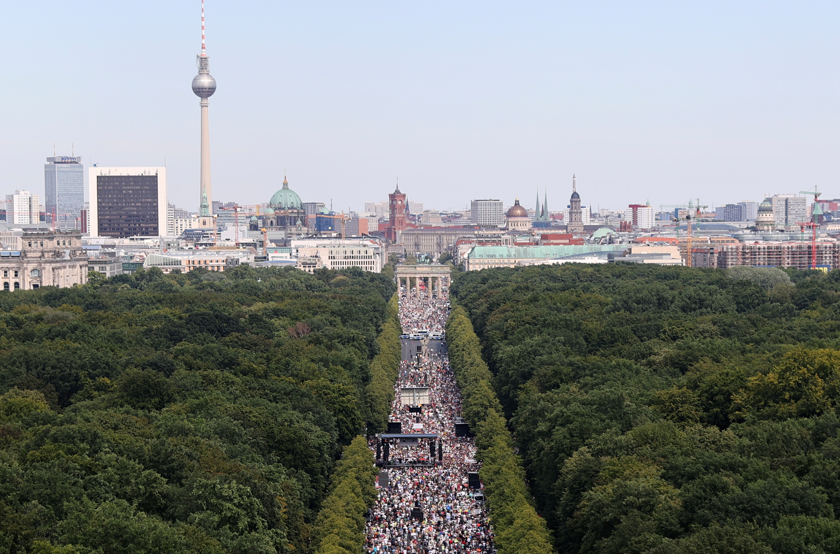 Demonstrators march during a protest against the government's restrictions amid the coronavirus disease (COVID-19) outbreak, in Berlin, Germany, August 1, 2020. REUTERS/Fabrizio Bensch