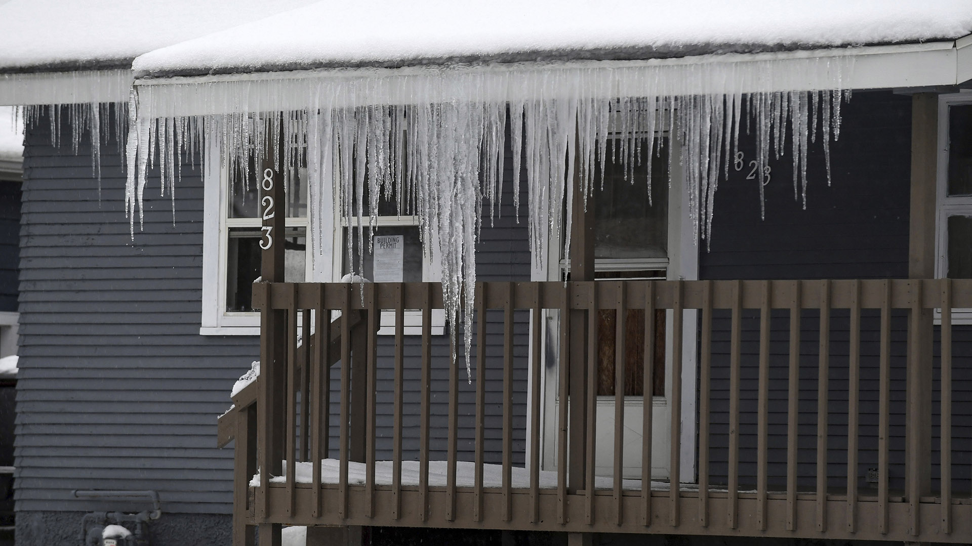 Subzero temperatures, ice and snow accumulation in 15 states of the nation (Erin Woodiel /The Argus Leader via AP)