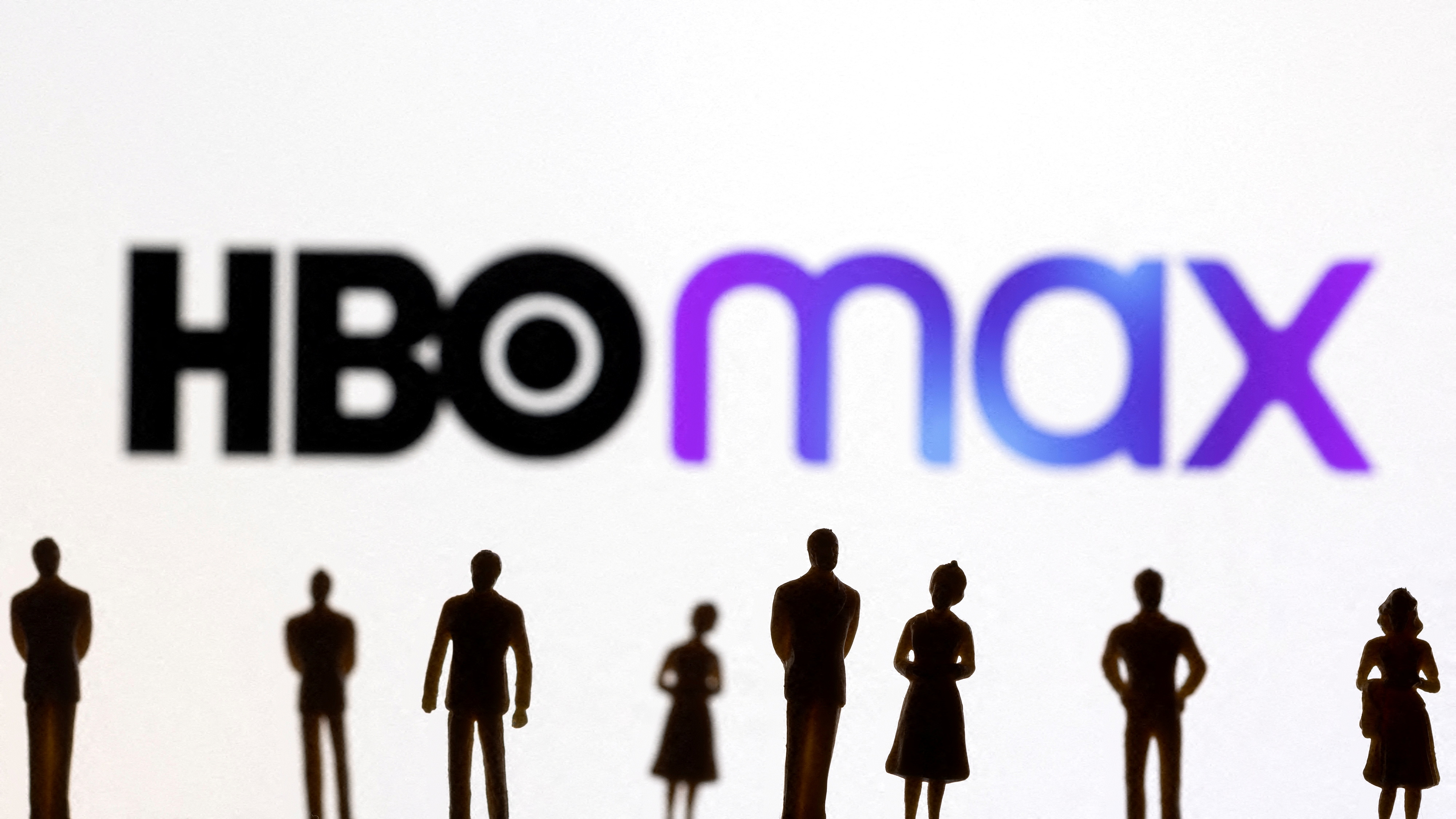 FILE PHOTO: Toy figures of people are seen in front of the displayed HBO Max logo, in this illustration taken January 20, 2022. REUTERS/Dado Ruvic/Illustration/File Photo