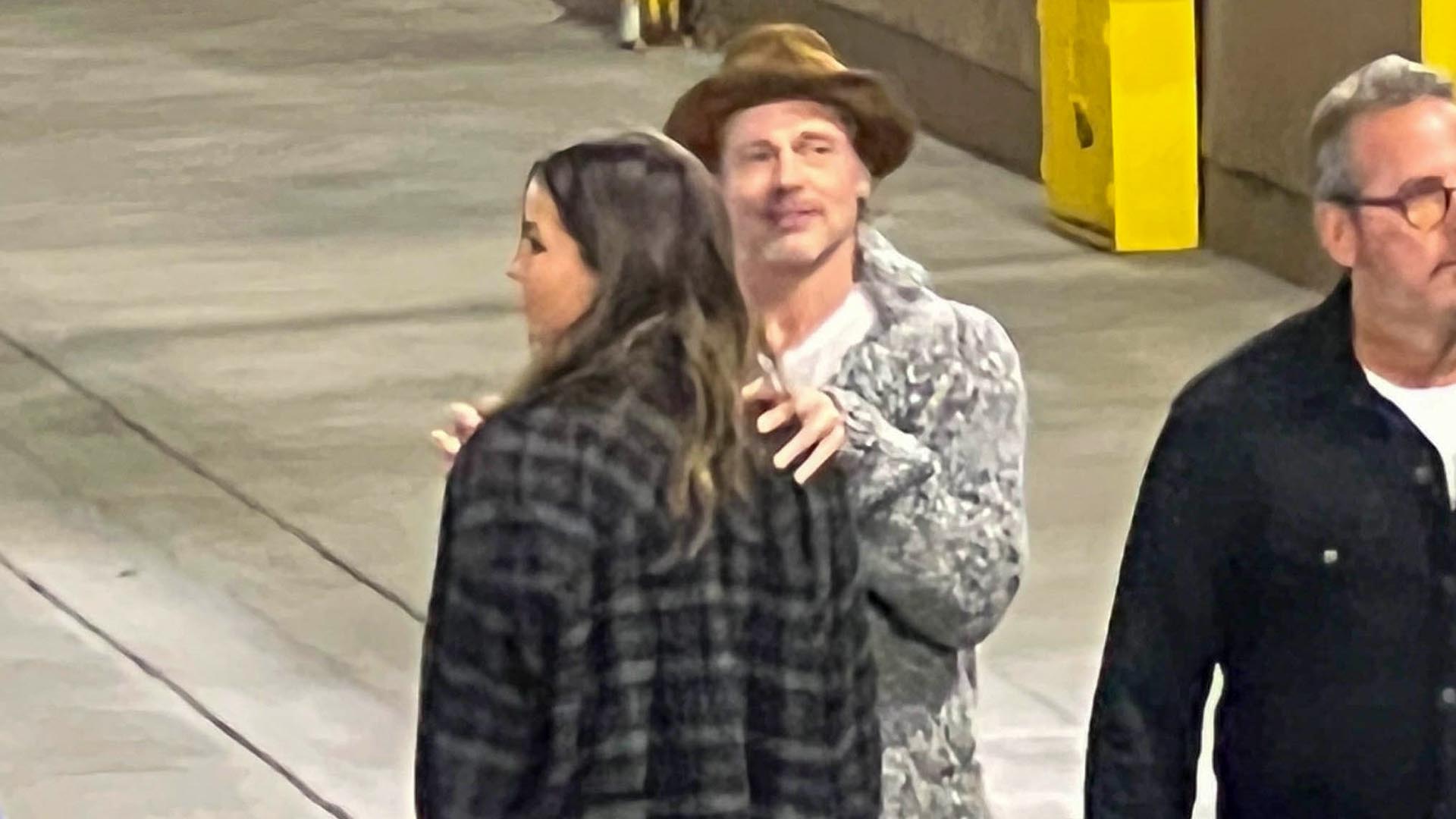 Brad Pitt was seen with Inés de Ramón at Bono's concert at The Orpheum theater in Los Angeles (The Grosby Group) 